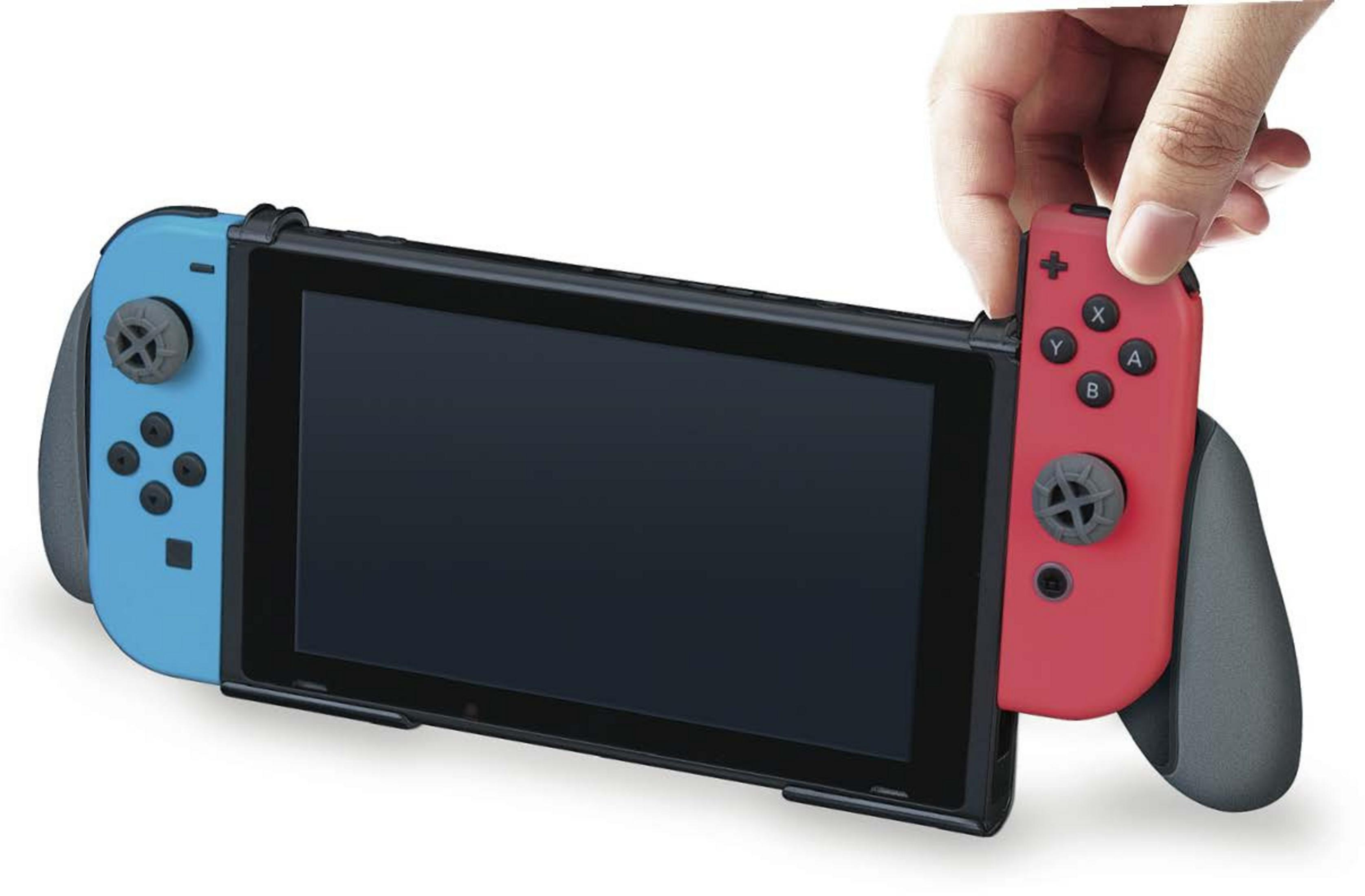 Ręka mocuje czerwony kontroler Joy-Con do konsoli Nintendo Switch.