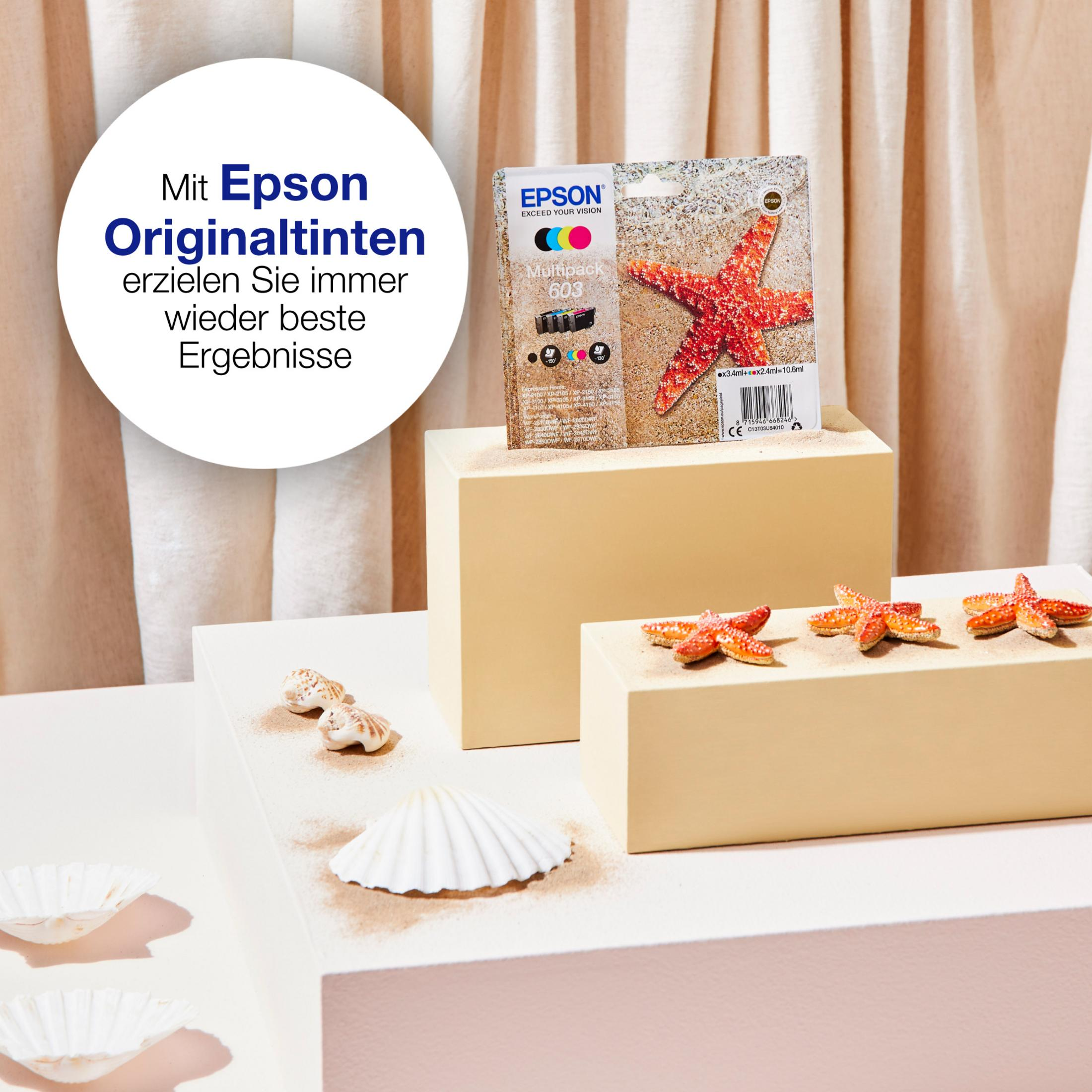 Epson Druckerpatronen auf Sand und Muscheln, mit Text über Originaltinten.
