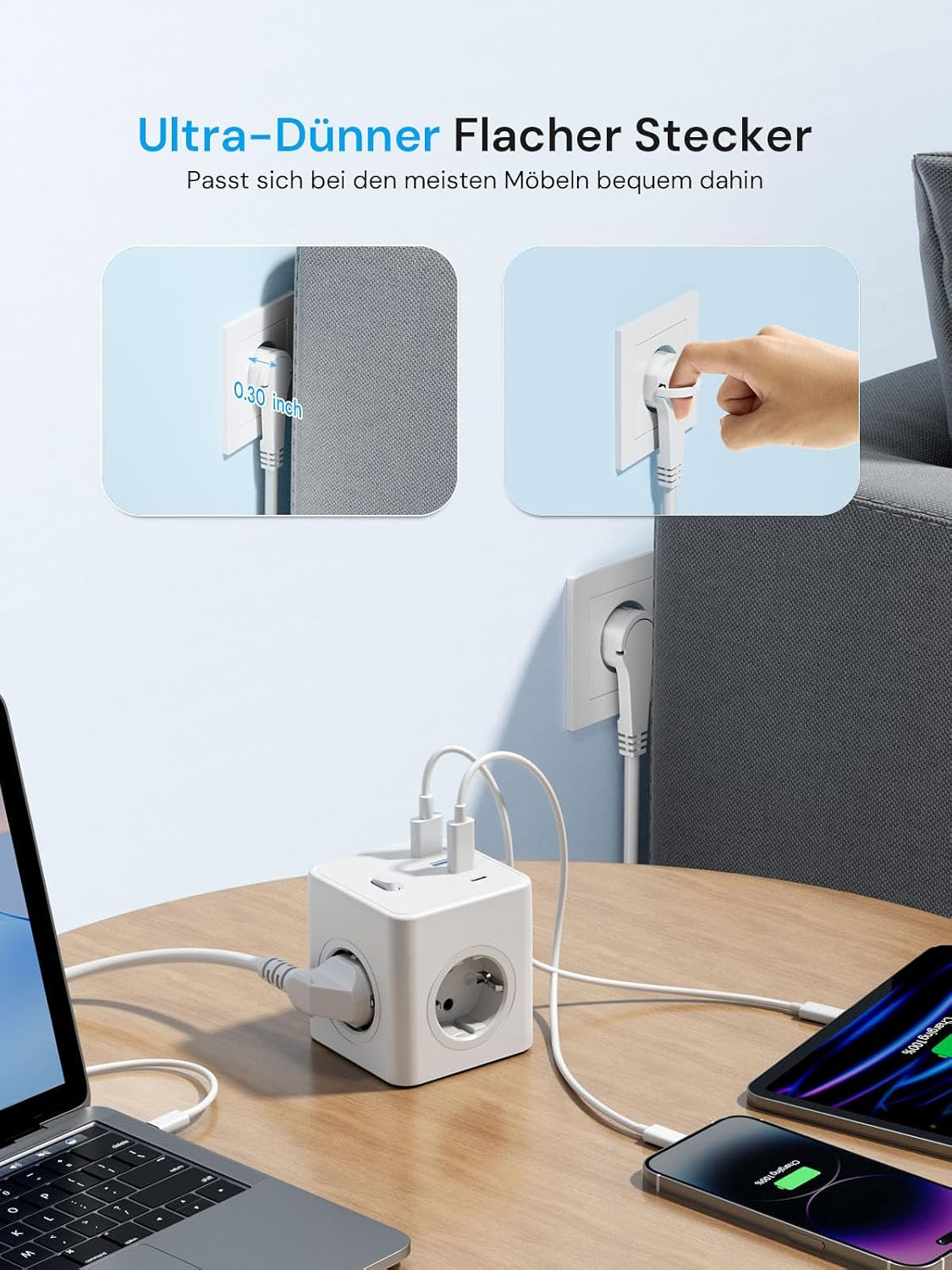 Biała kostka przedłużająca z podłączonymi urządzeniami.