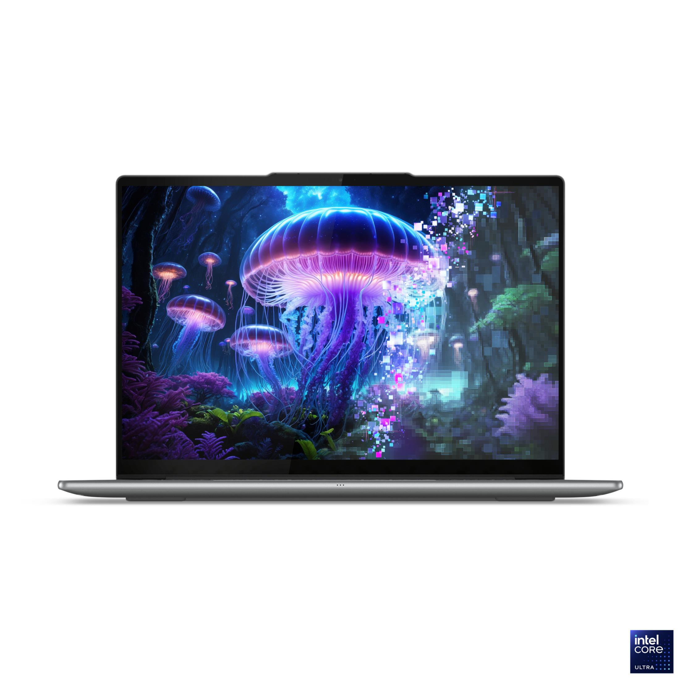 Laptop wyświetla podwodną scenę ze świecącymi meduzami i cyfrowym efektem pikseli.