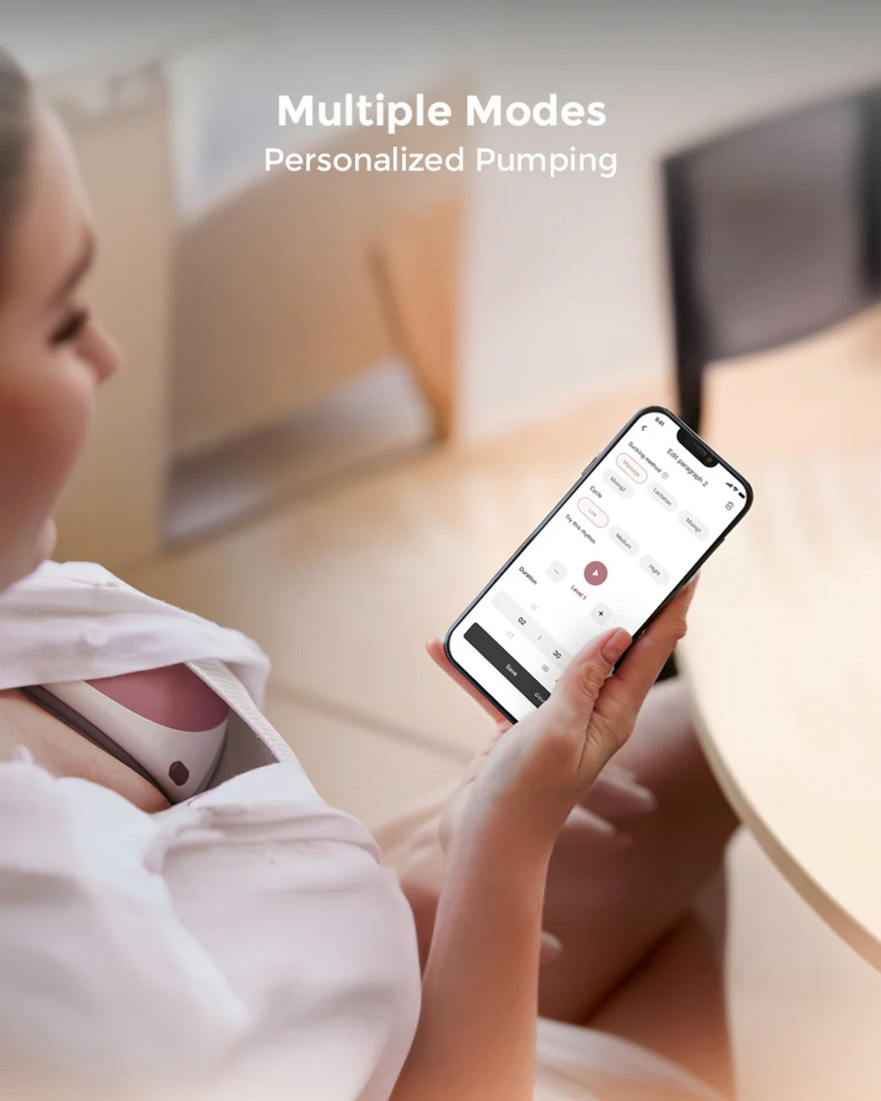 Mujer con teléfono que muestra app de extractor de leche con modos.