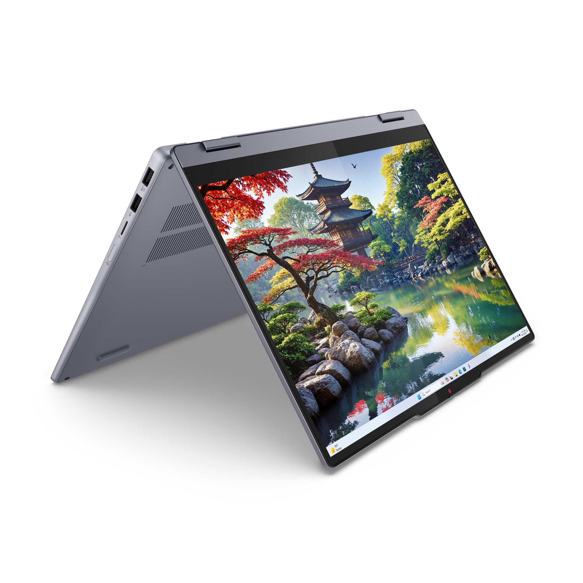 Ein offenes graues Laptop zeigt eine traditionelle japanische Gartenlandschaft auf dem Bildschirm.