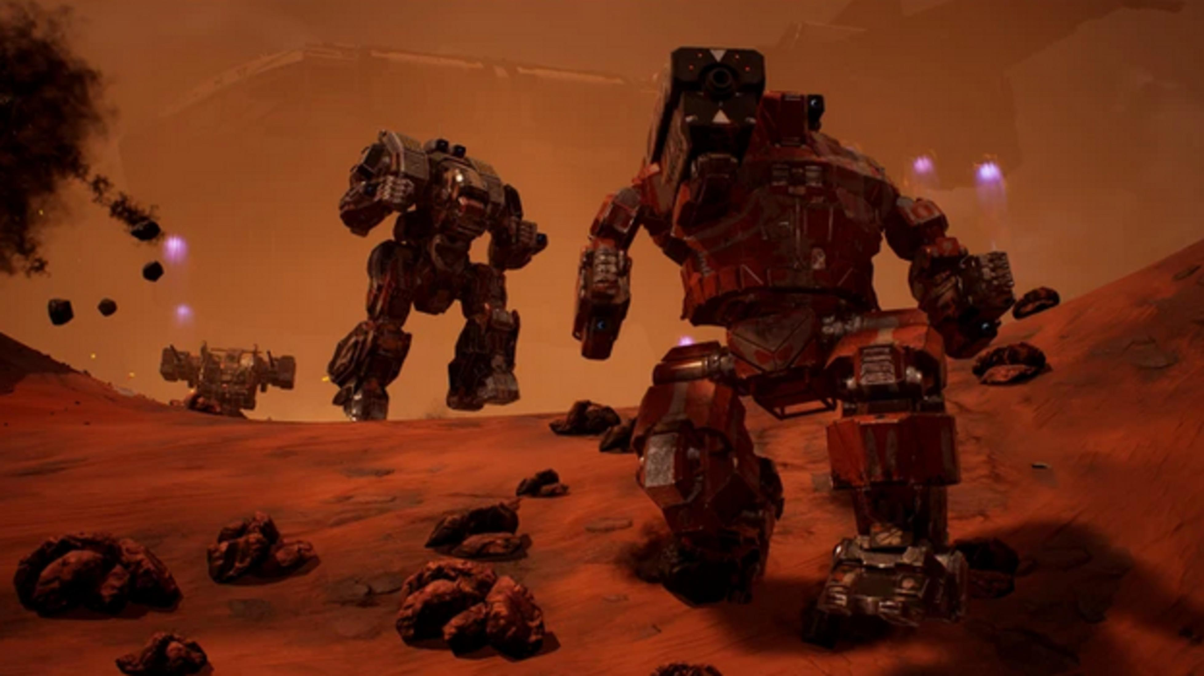 Zwei Mechs bewegen sich auf einer roten, felsigen Oberfläche. Rauch steigt auf.