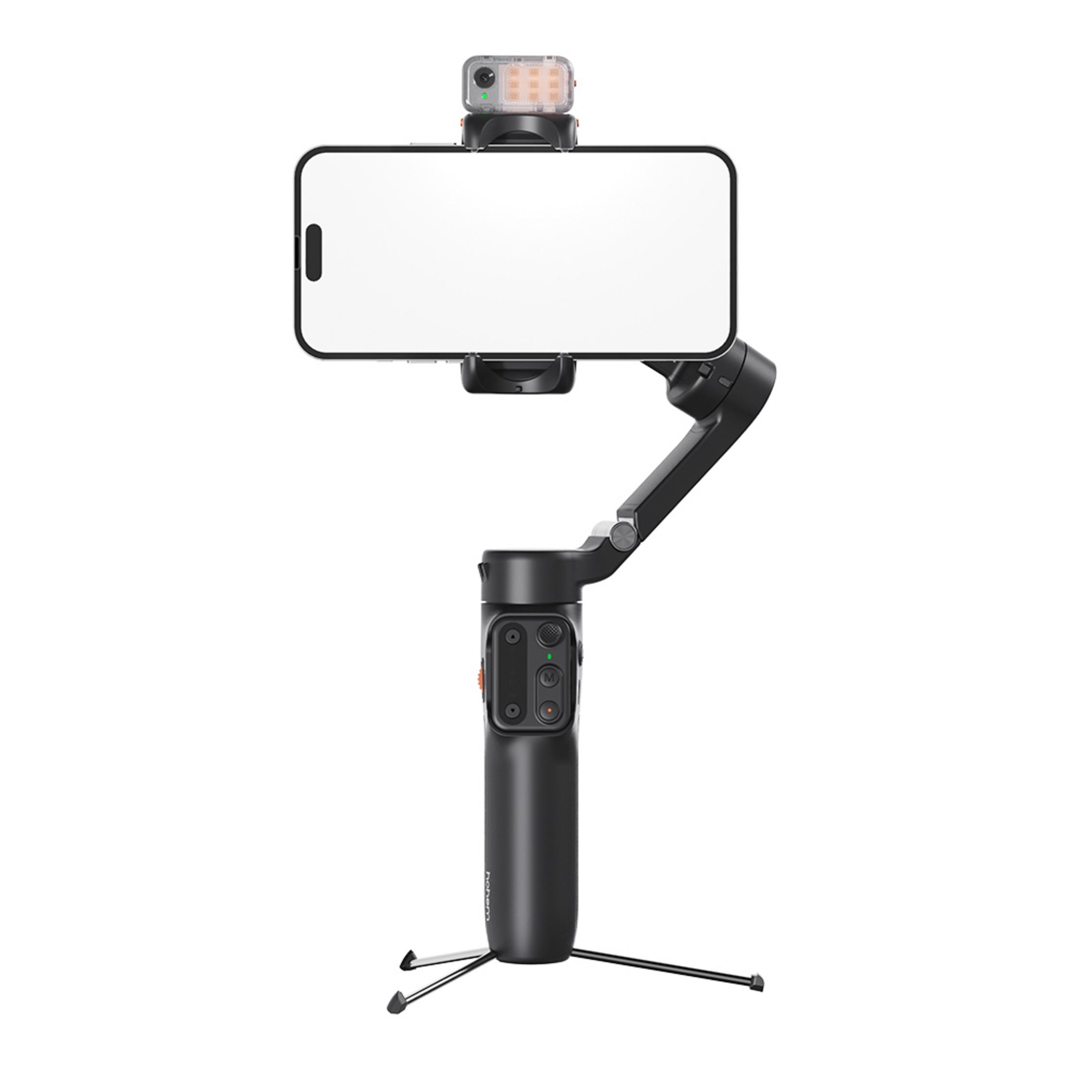 Czarny gimbal do smartfona z telefonem i lampką LED.