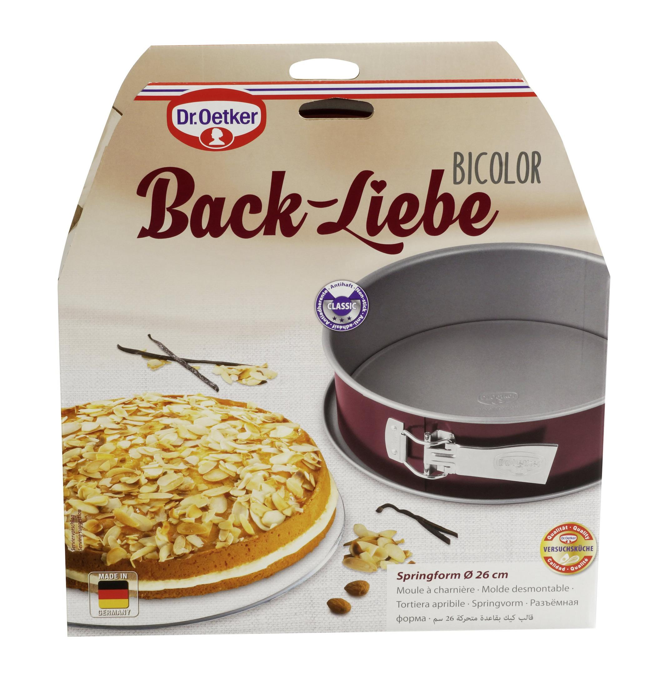Dr. Oetker Back-Liebe Bicolor Springform mit Kuchen und Vanilleschoten.