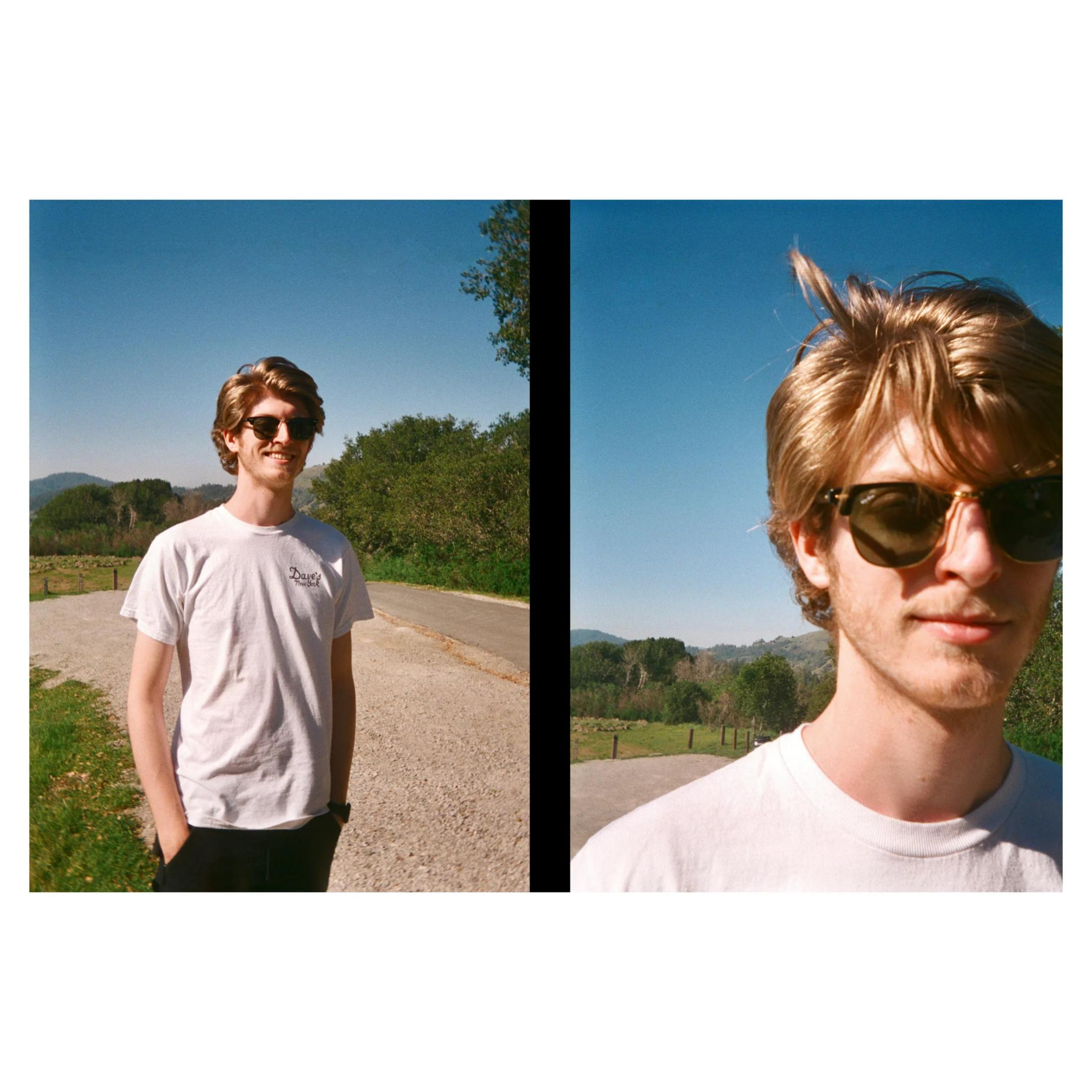 Un joven con gafas de sol está al aire libre.