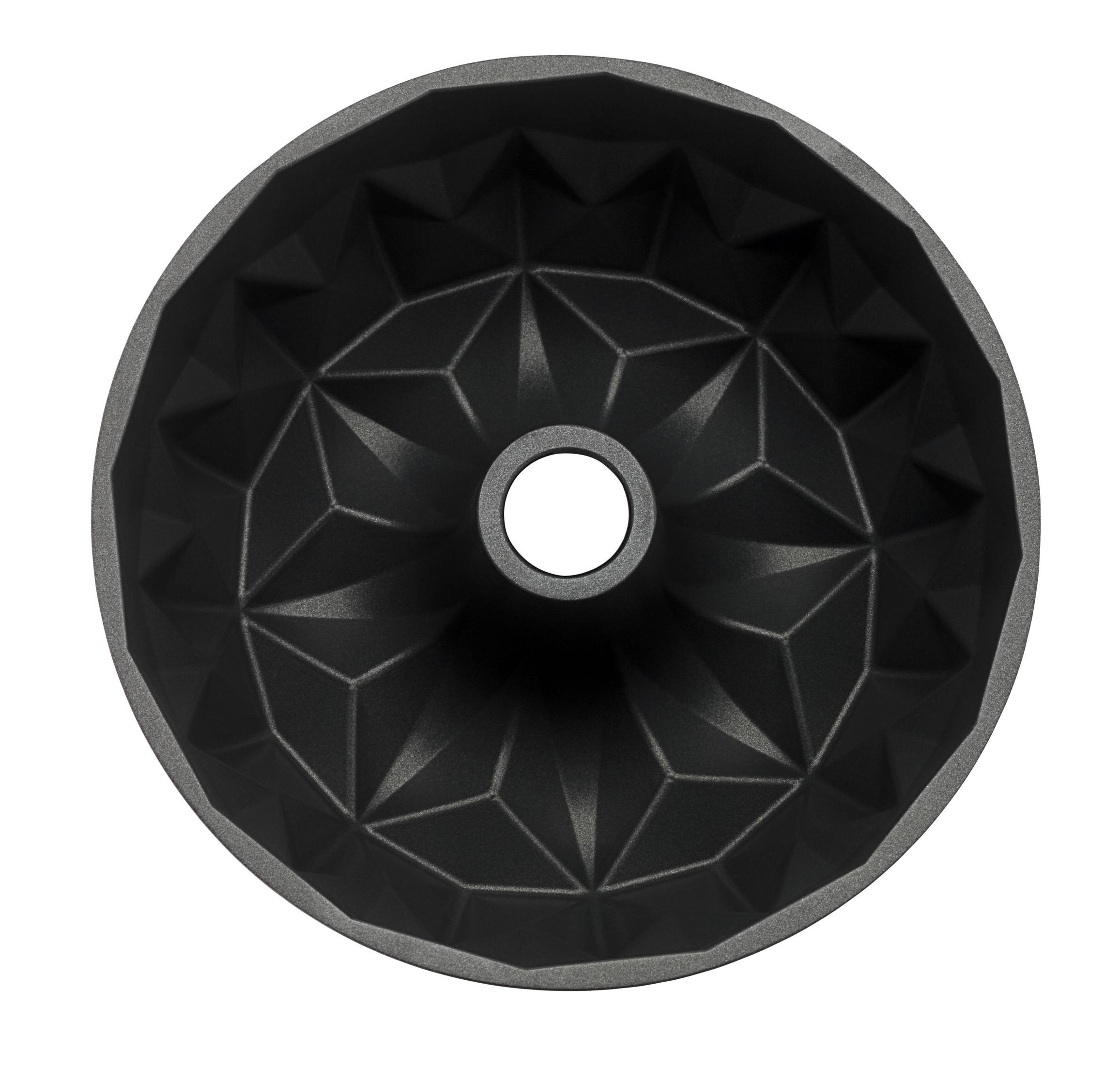 Szara forma do babki o gwieździstym wzorze i centralnym otworze.