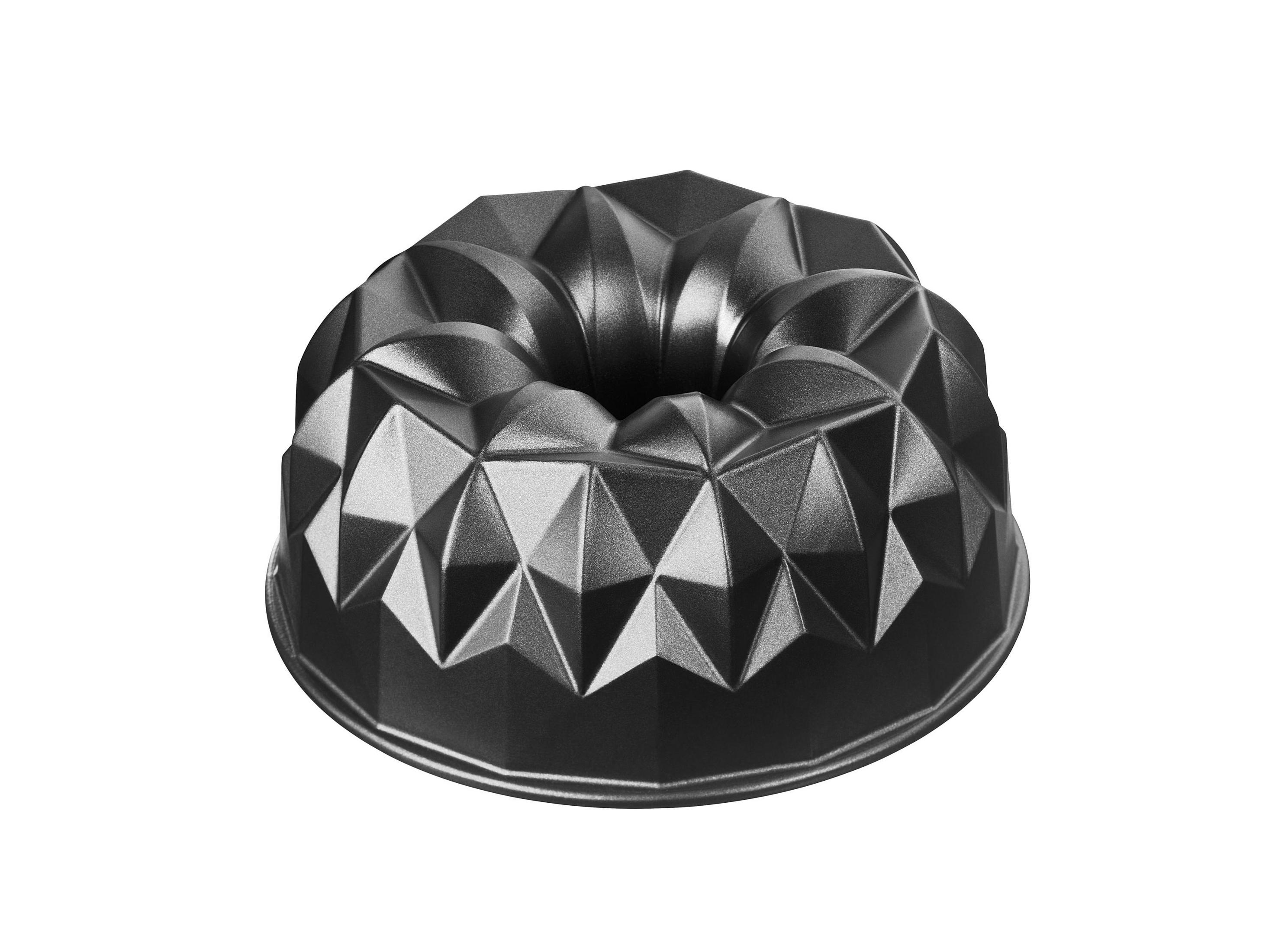 Ciemna, geometryczna forma do babki z pionowymi żłobieniami.