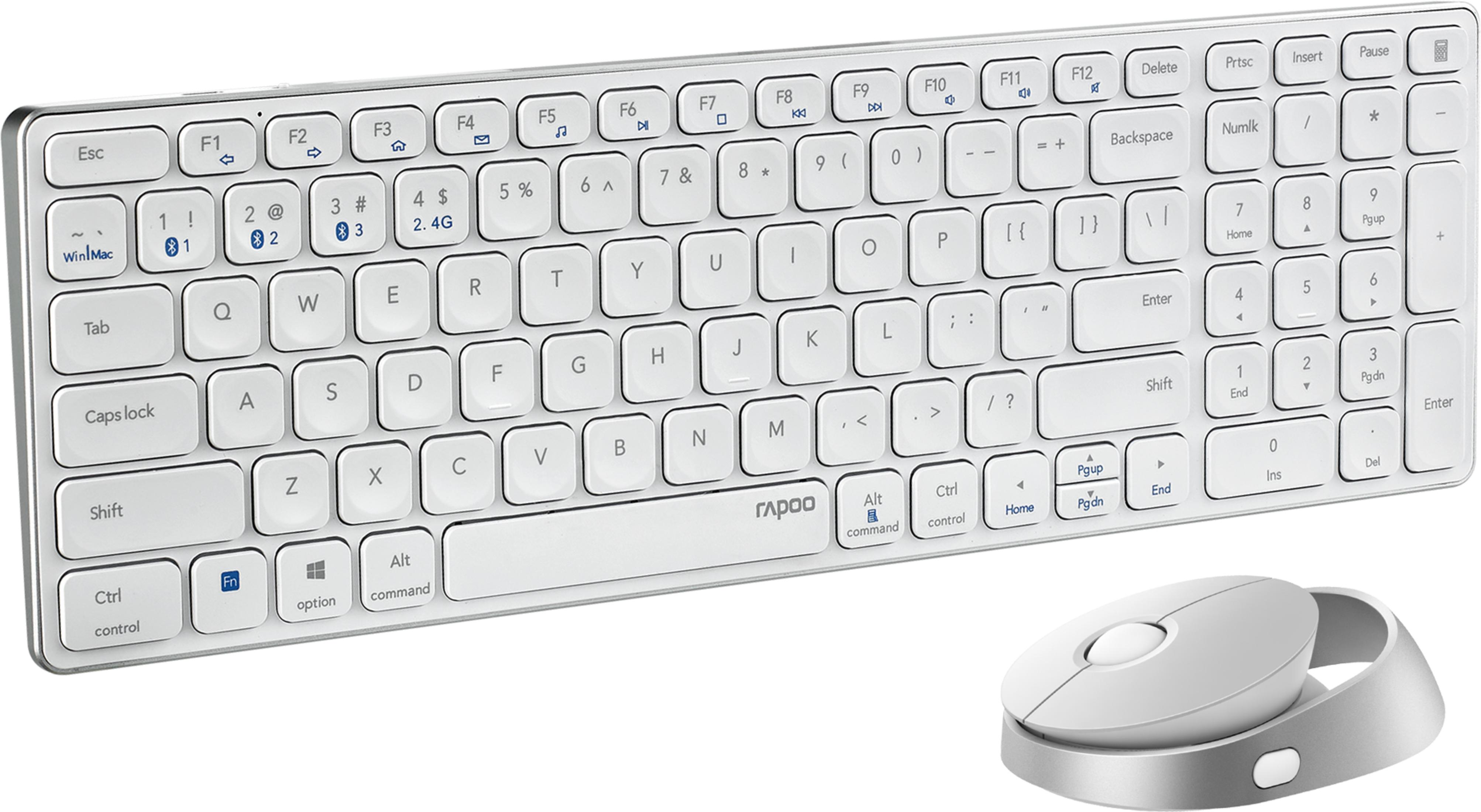 Un set di tastiera e mouse wireless bianchi su sfondo bianco.