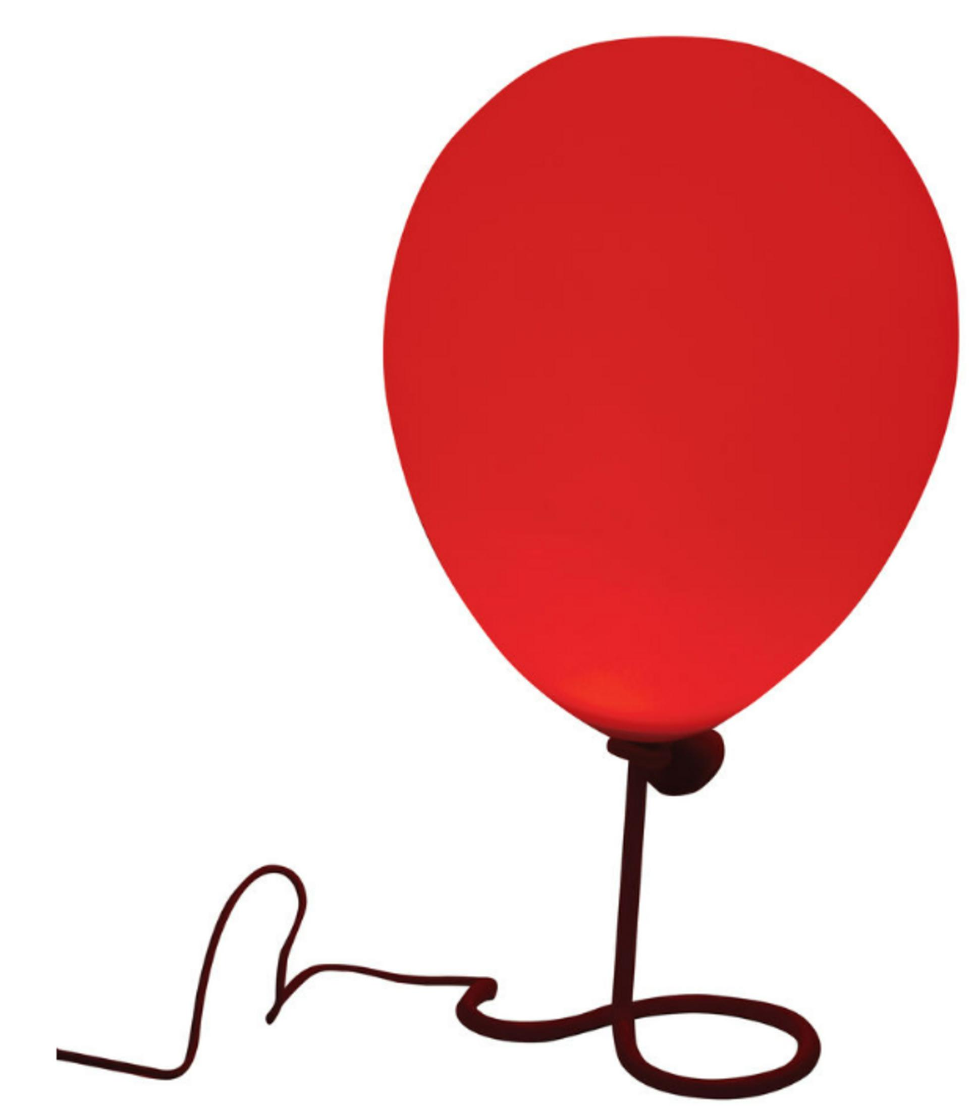 A red balloon lamp with a dark stand and cord on a white background.