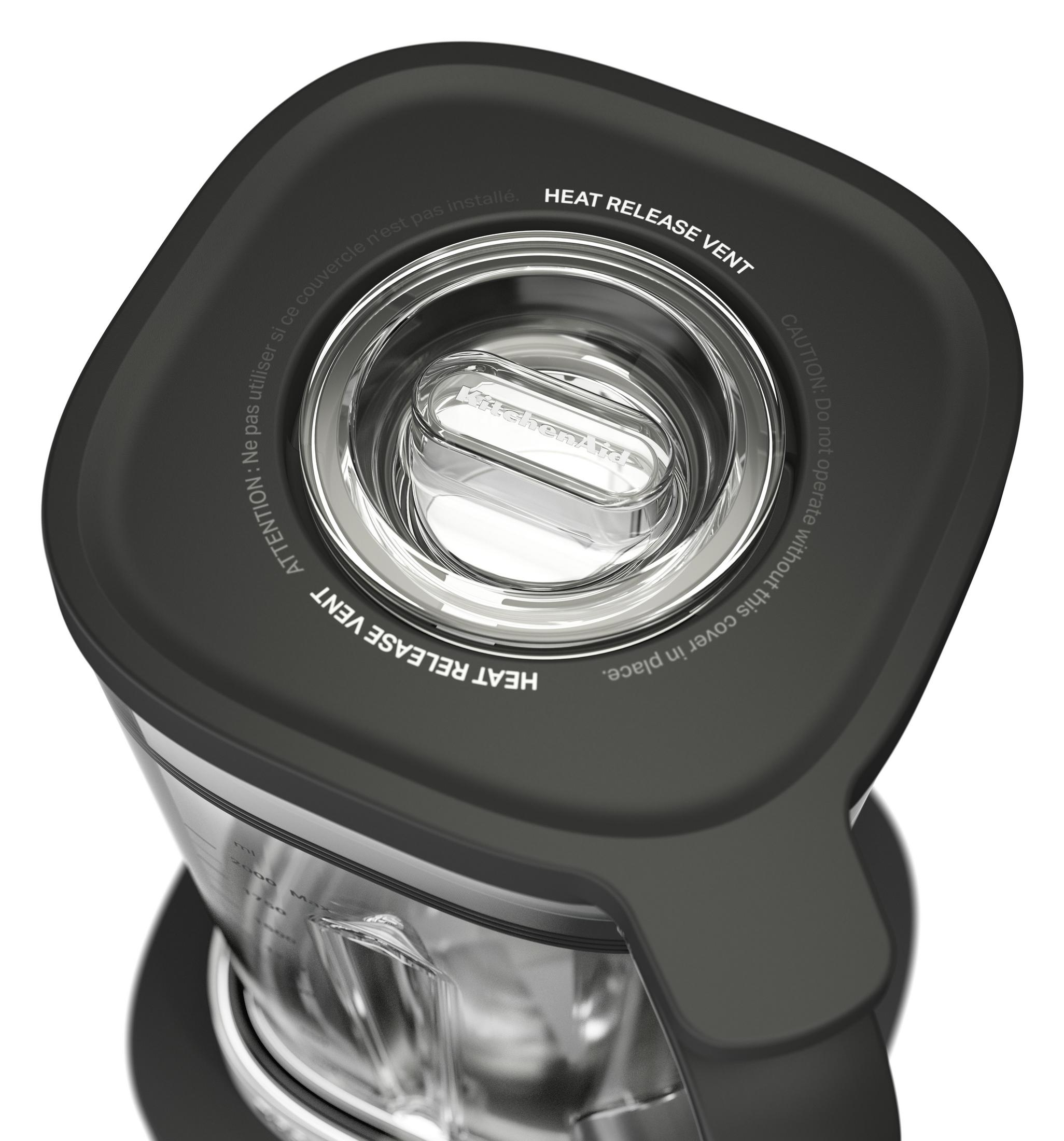 Coperchio nero frullatore con testo "Heat Release Vent".
