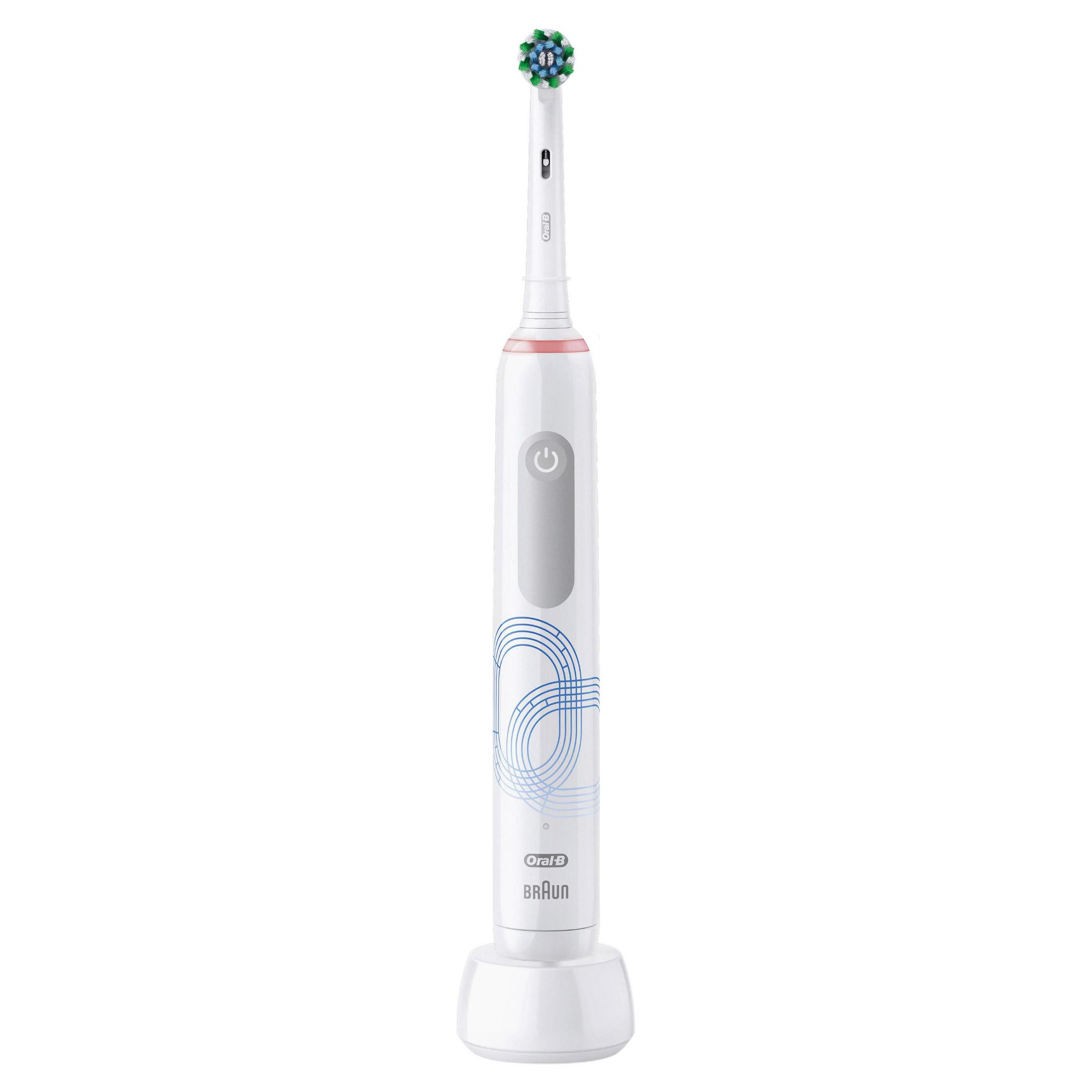 Cepillo de dientes eléctrico blanco y rosa con patrón azul, en base de carga.