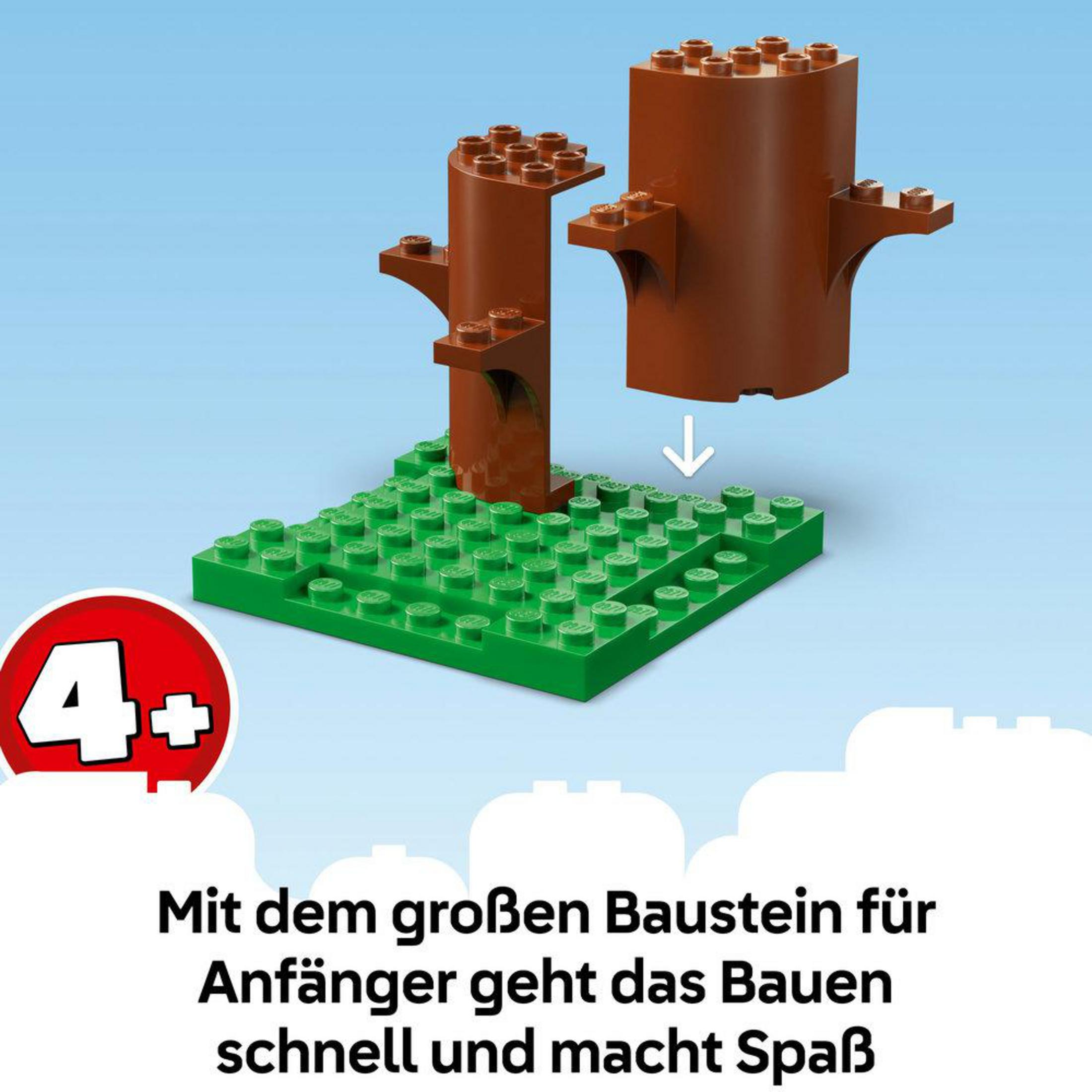 Yeşil Lego taban plakası üzerinde ağaçları oluşturan kahverengi Lego tuğlalar.
