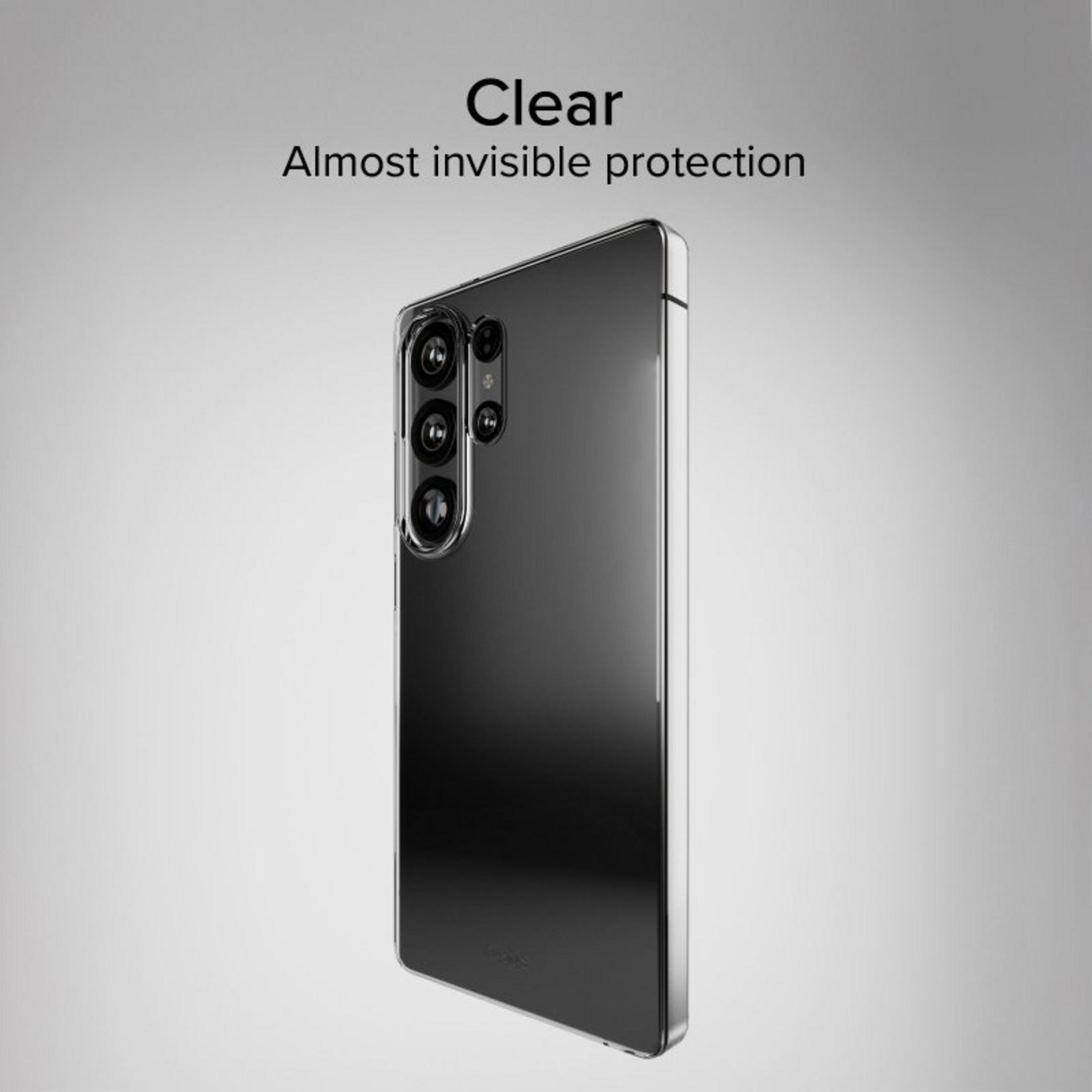 Custodia trasparente per telefono con obiettivi della fotocamera su sfondo grigio.