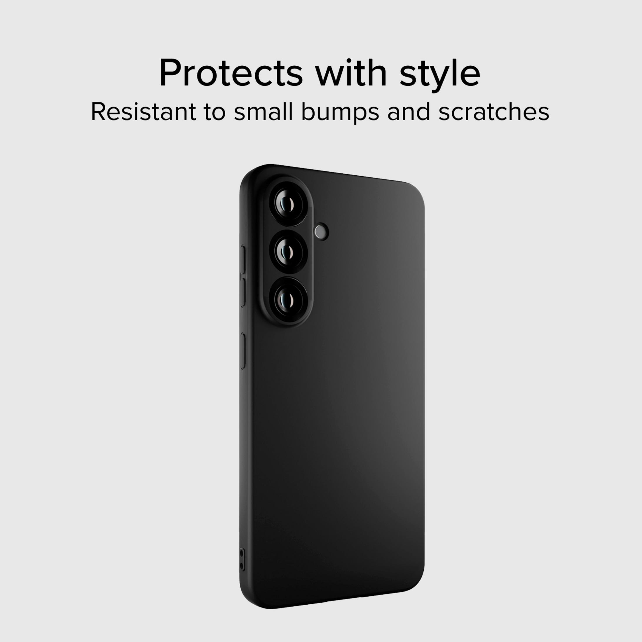Schwarzes Handy mit drei Kameras. Auf grauem Hintergrund.