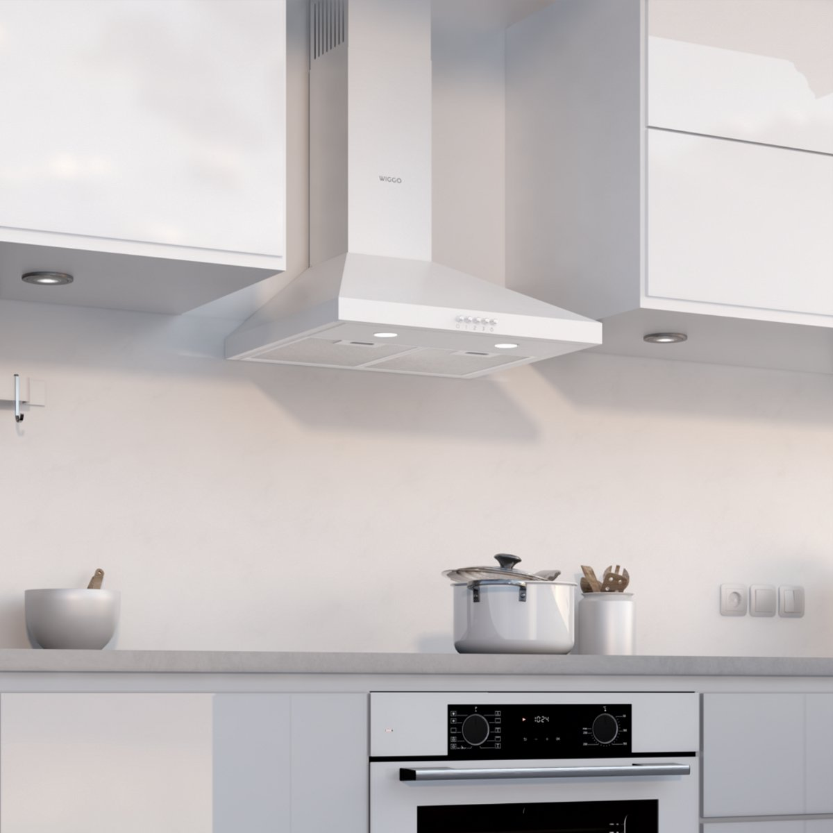 A white range hood with lights above a stove and a pot.