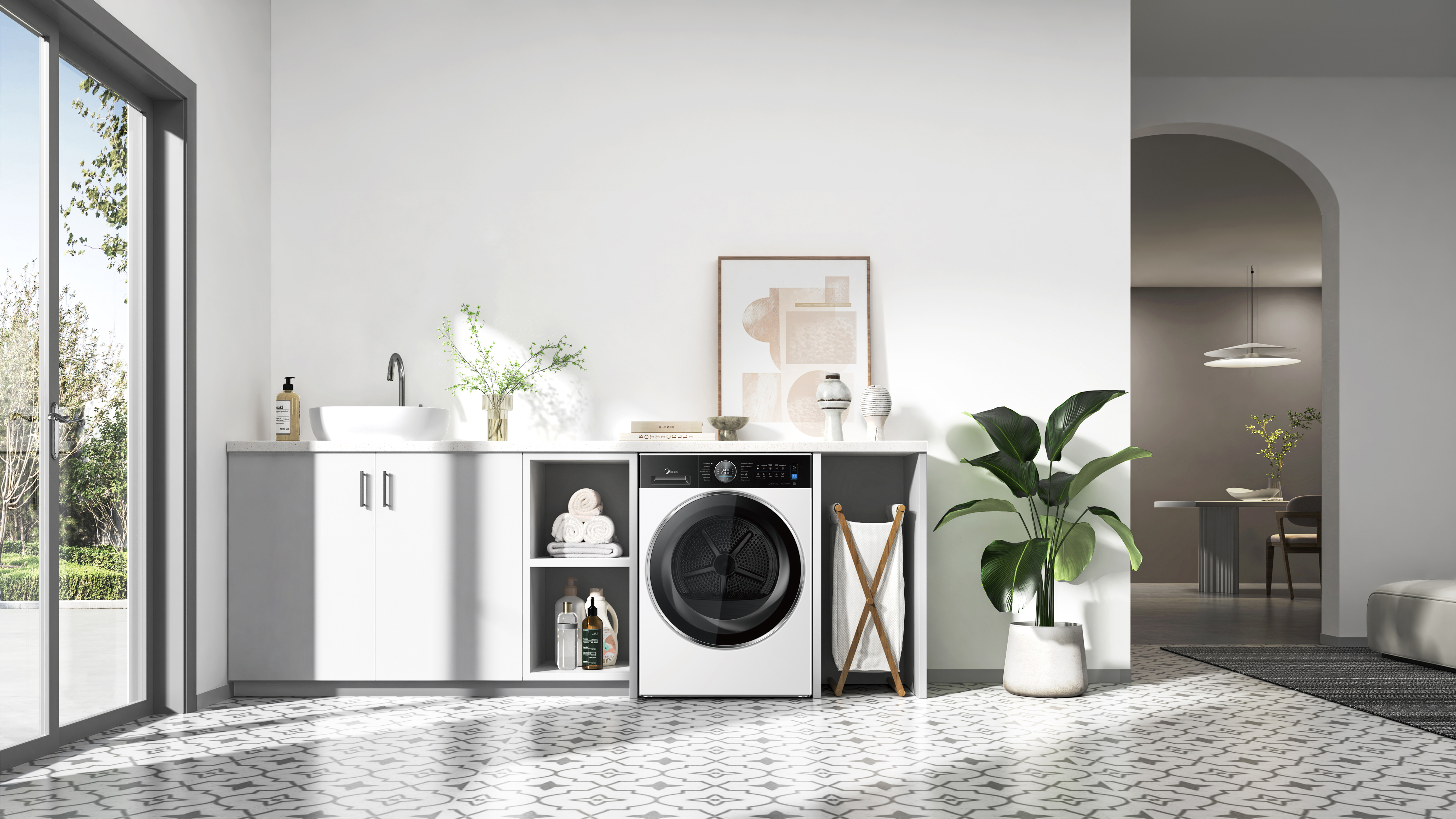 Moderner Waschraum mit Waschmaschine, Waschbecken, Pflanzen und Kunst.