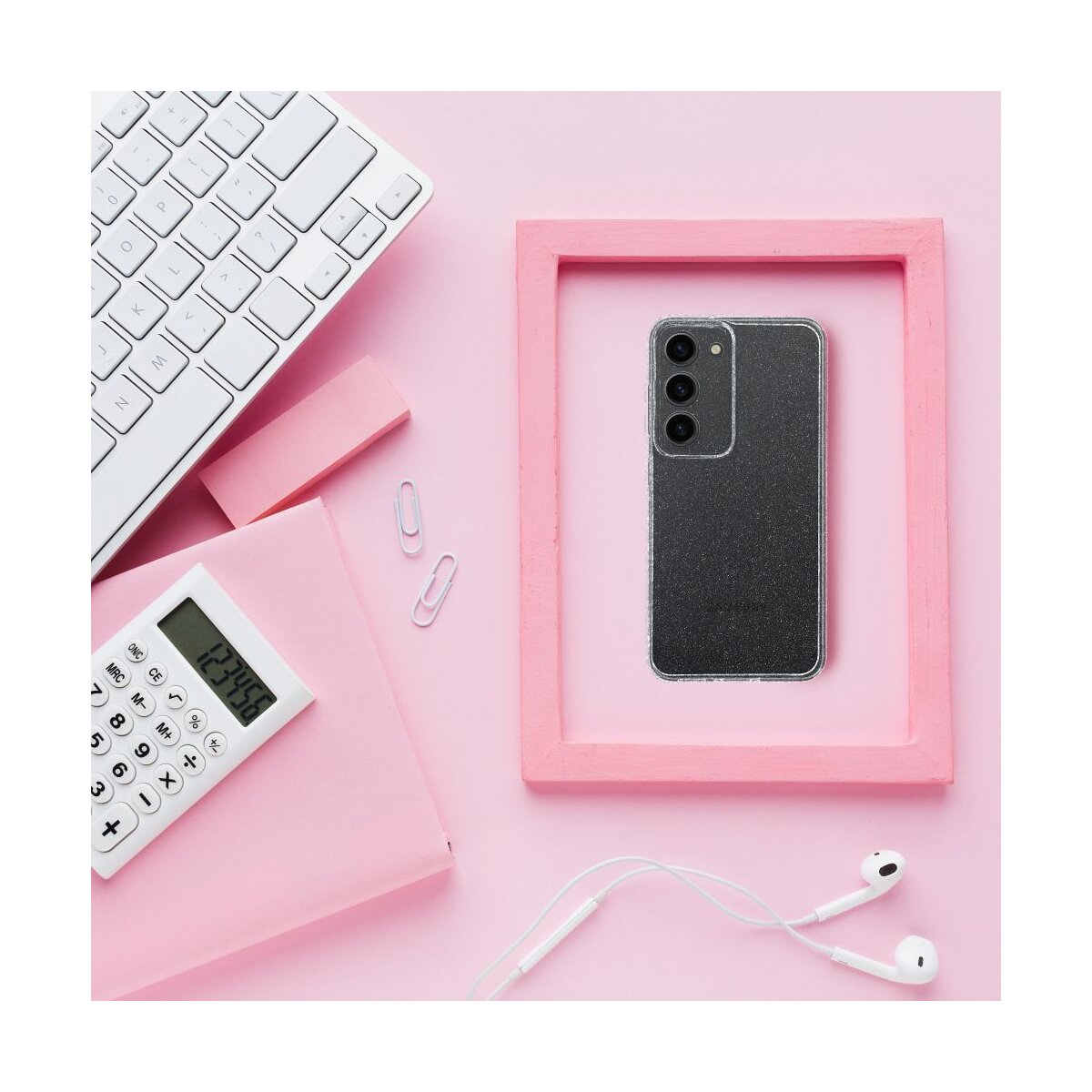Custodia glitterata per telefono in cornice rosa, con tastiera, calcolatrice e taccuino.