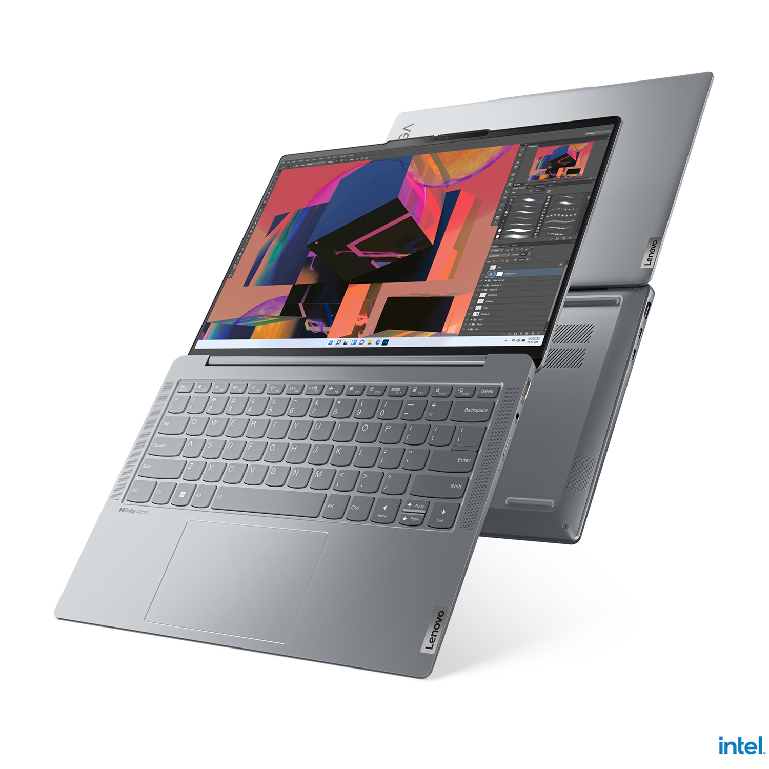 Un laptop Lenovo grigio aperto mostra grafiche colorate sullo schermo.