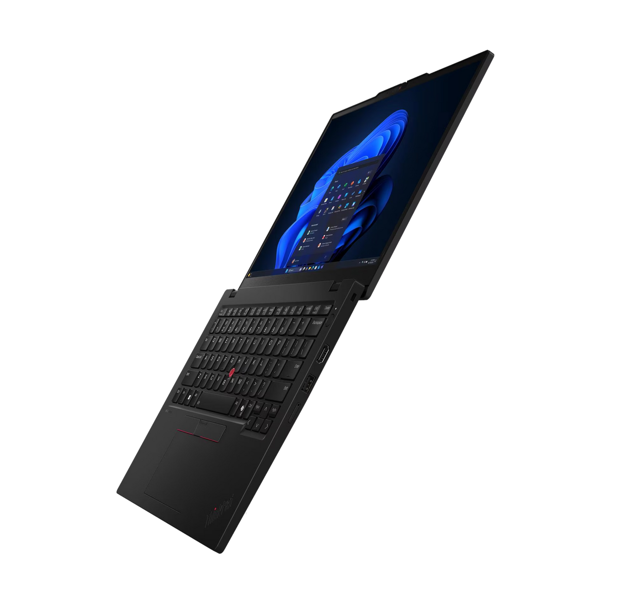 Un portátil negro abierto con pantalla iluminada, mostrado sobre fondo negro.