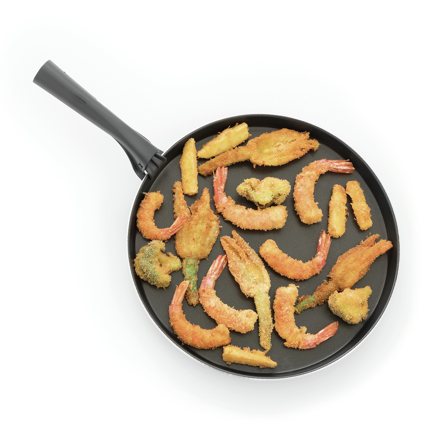 Fried shrimp and vegetables in a pan on a white background.