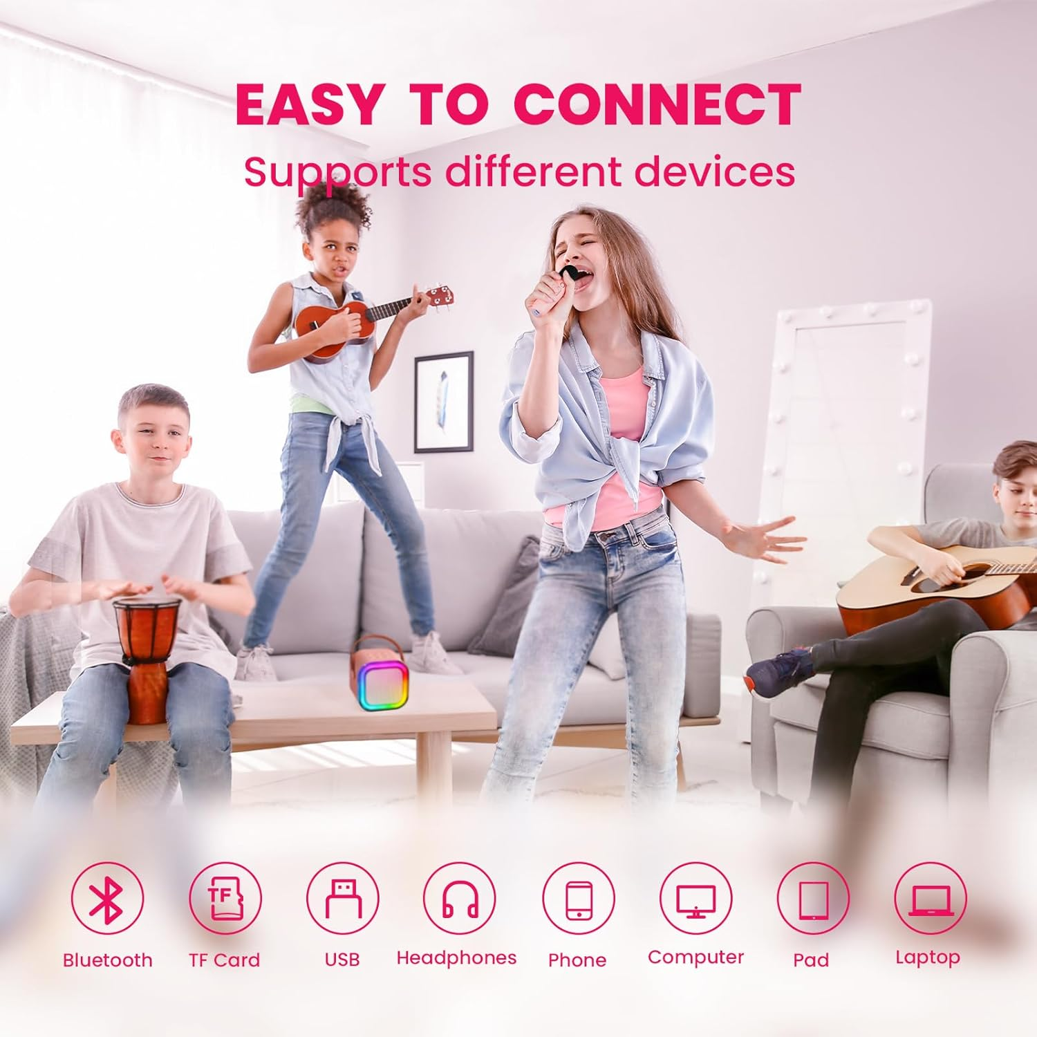 Cztery dzieci cieszą się muzyką: jedno gra na bębnie, jedno śpiewa, jedno gra na gitarze, jedno na ukulele.