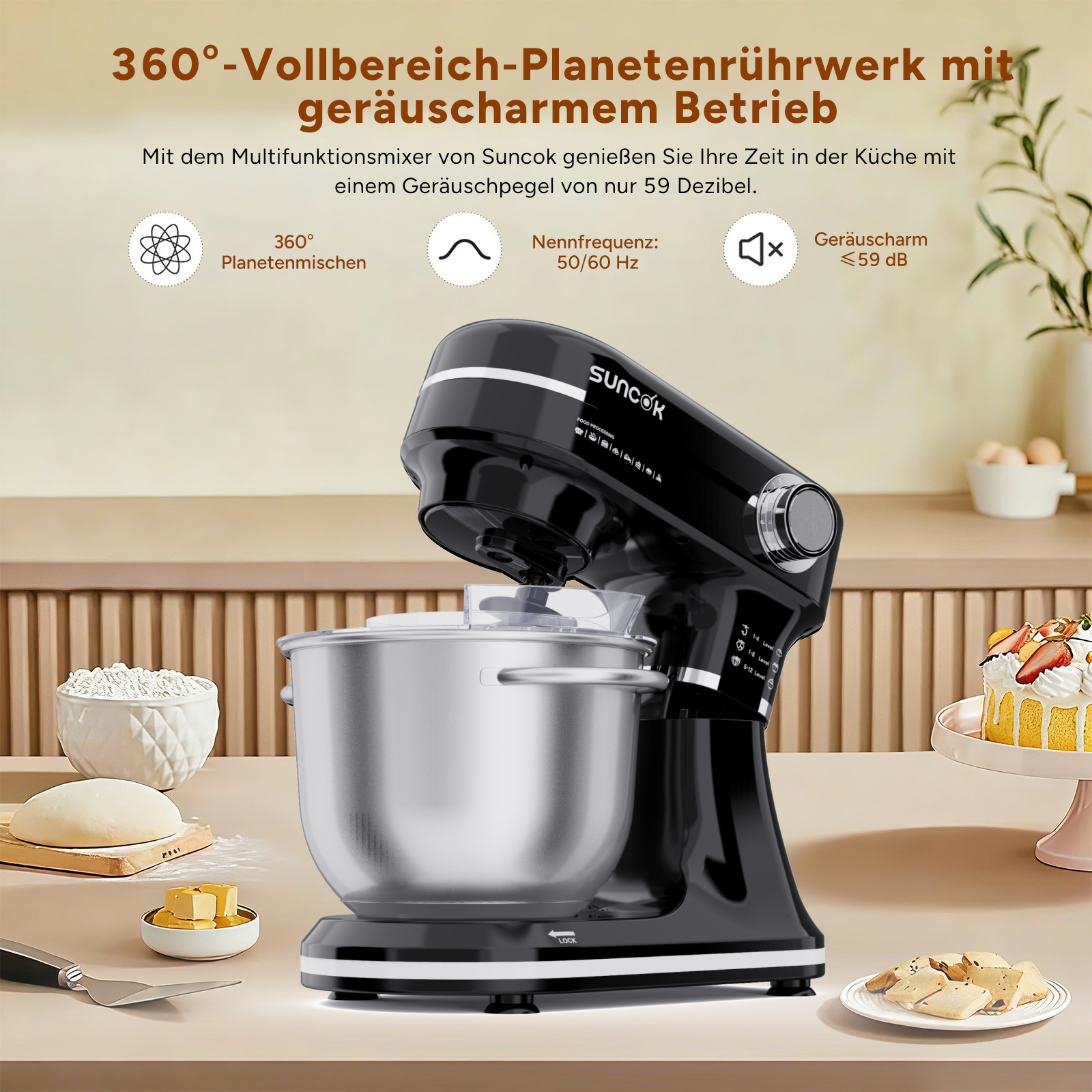 Ein schwarzer Küchenmixer mit Edelstahlschüssel steht auf einer Arbeitsplatte.
