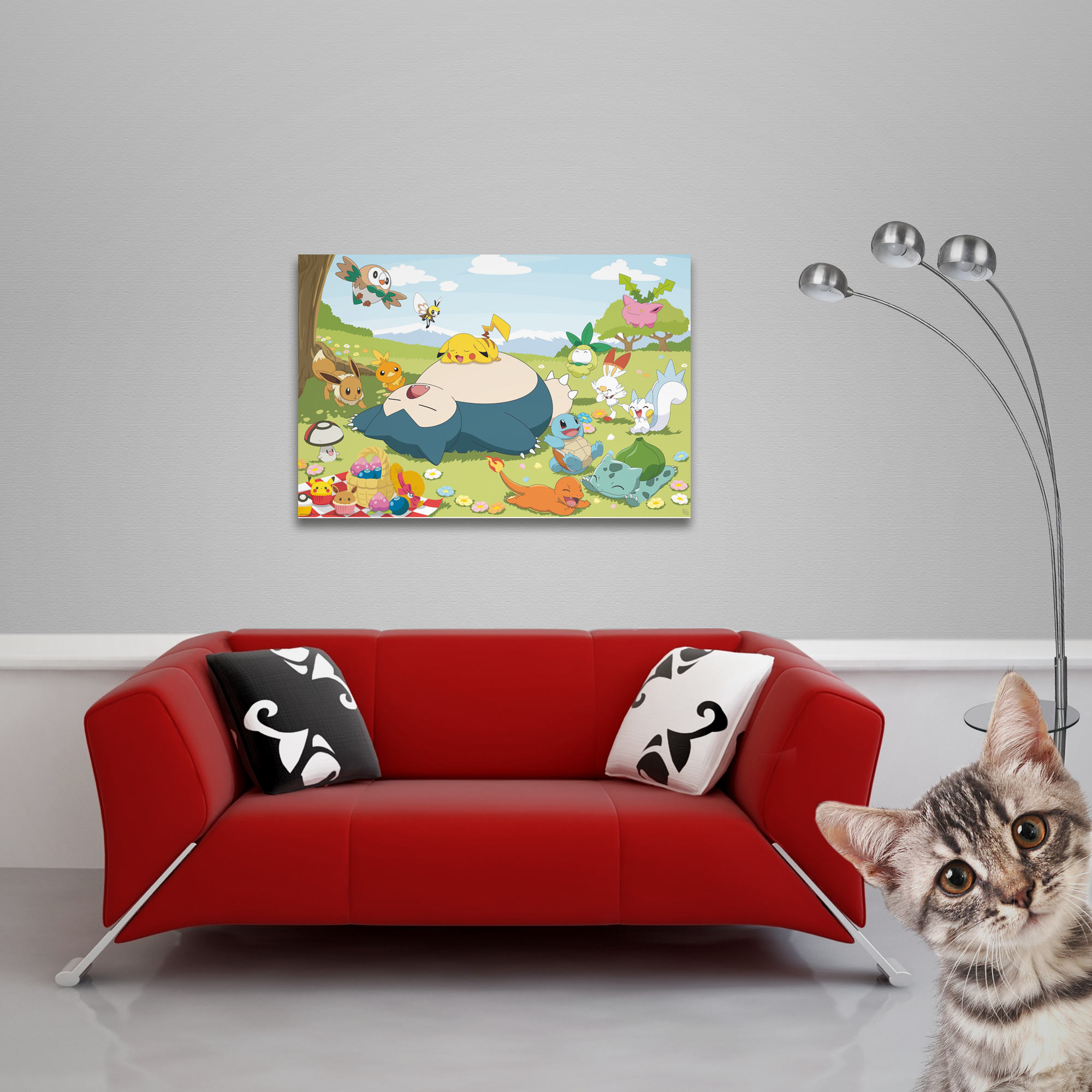Pokémon-Charaktere rasten auf einer Decke im Freien, mit einem großen Snorlax im Zentrum.