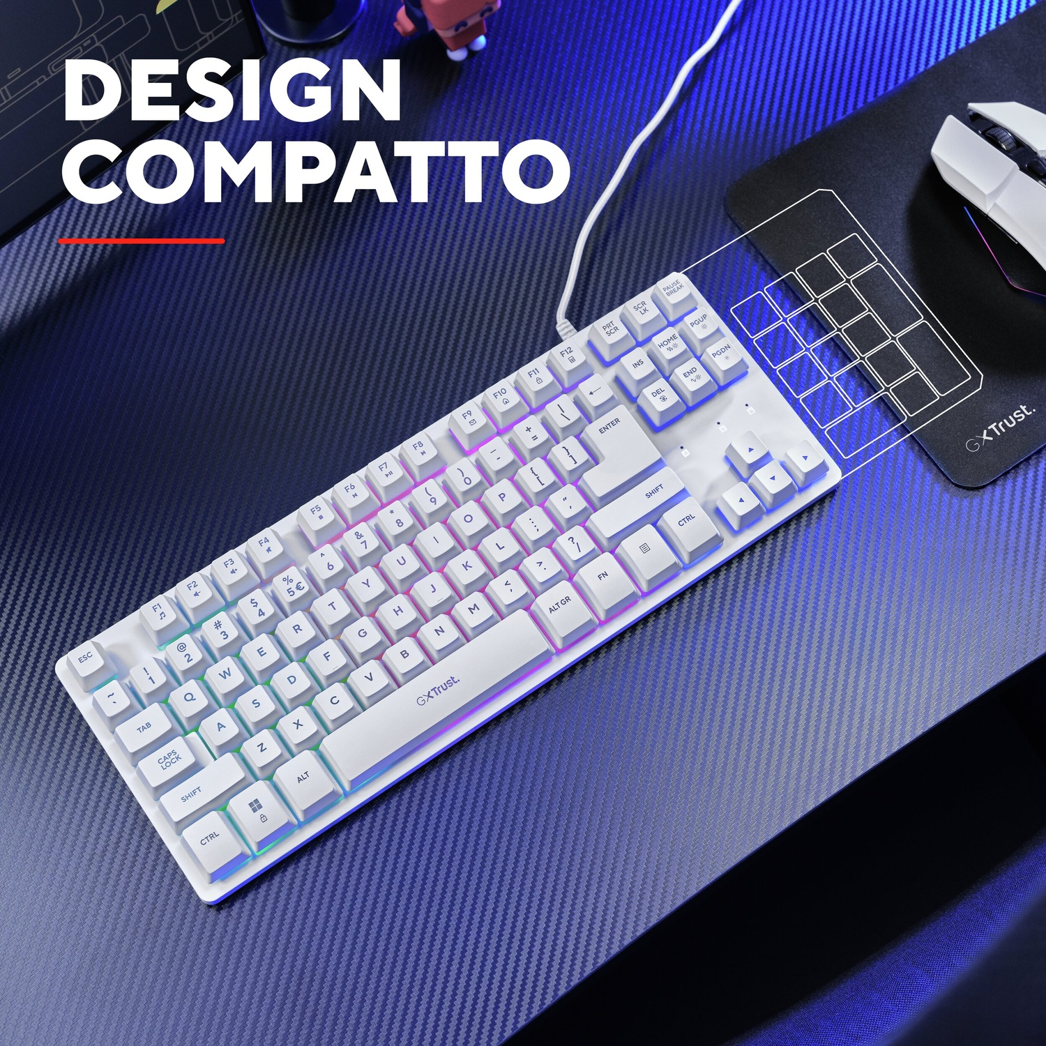 Un teclado blanco con iluminación RGB sobre una superficie de escritorio negra.