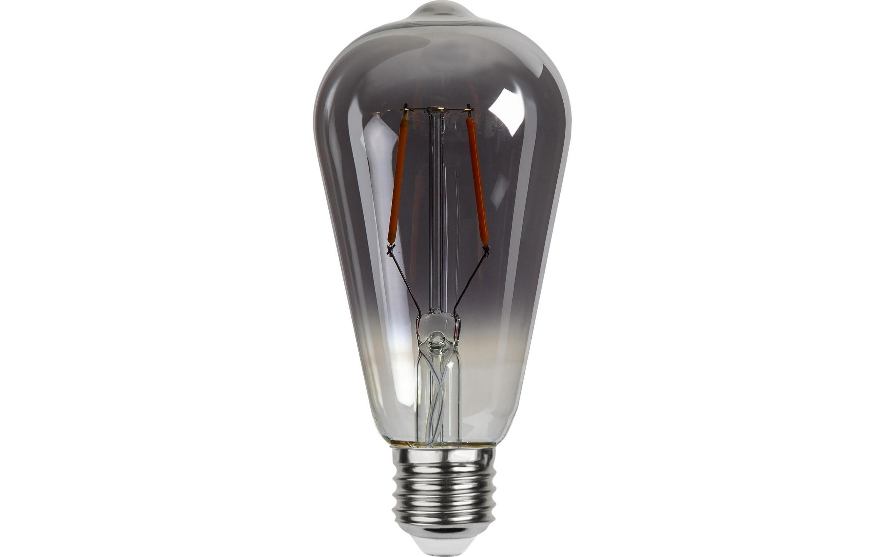 Une ampoule Edison en verre gris fumé avec filaments visibles.