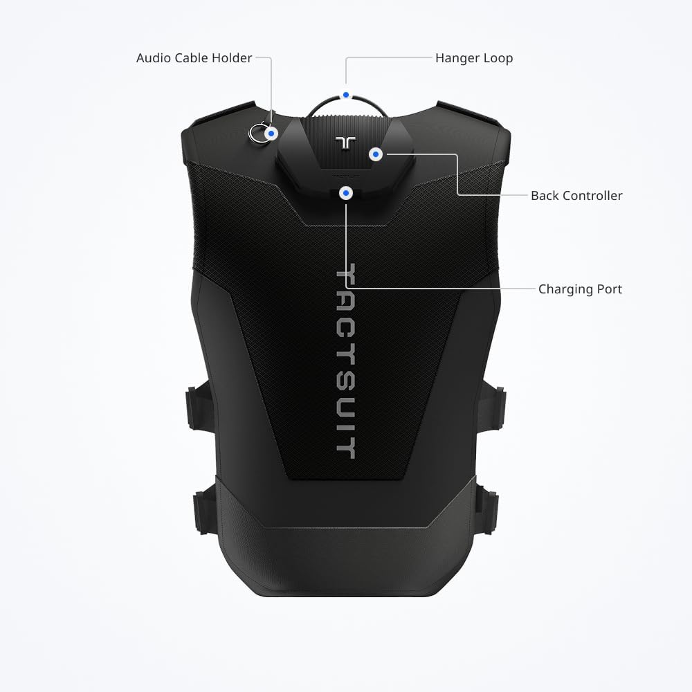 Chaleco negro con logo "TACTSUIT". Muestra colgador, puerto de carga y control.