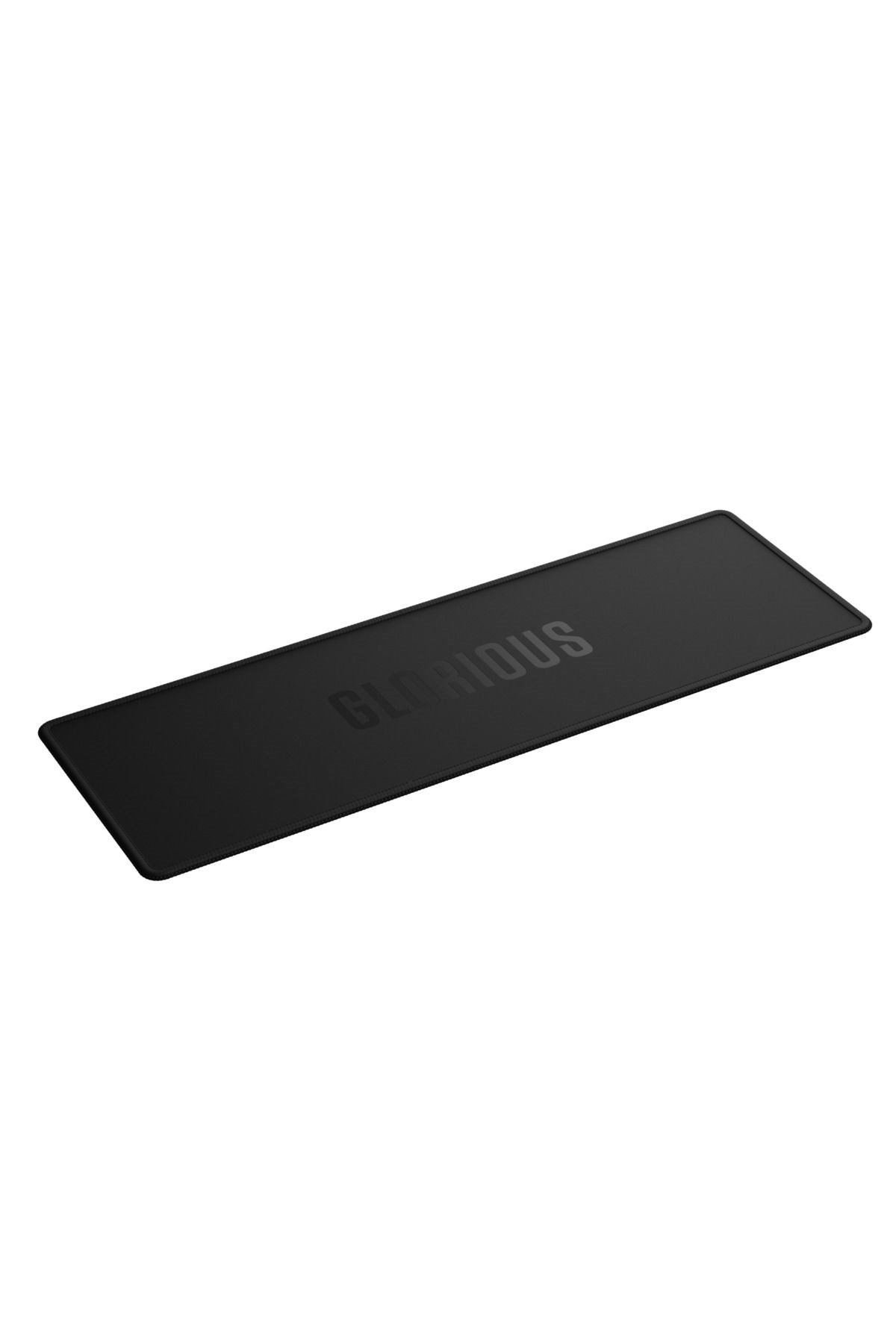 Kabartmalı "GLORIOUS" yazılı siyah mousepad.