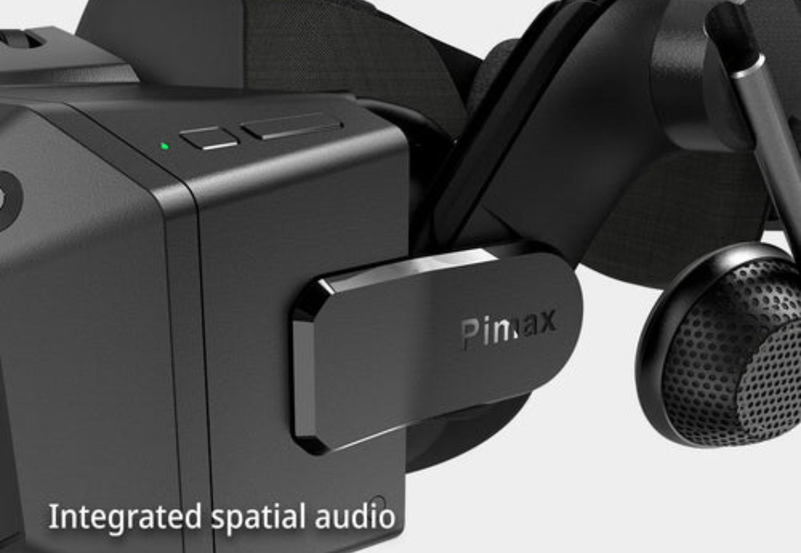 Un visore VR nero con cuffie integrate e logo Pin.max.