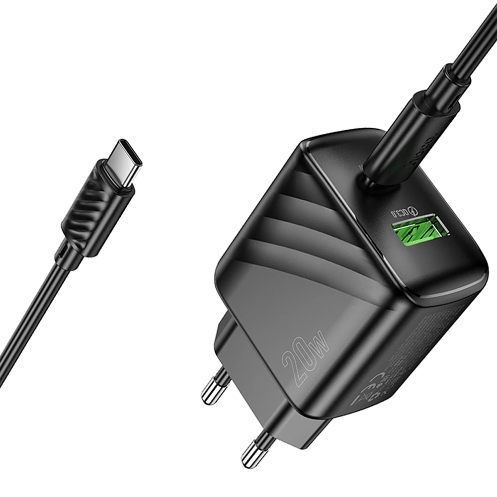 USB-C kablolu ve yeşil hızlı şarj portlu siyah şarj cihazı.