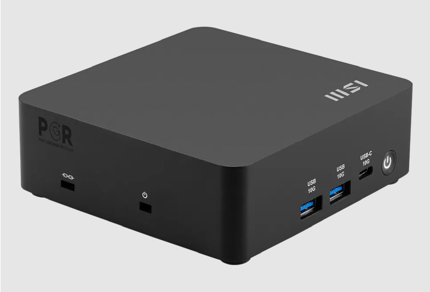 Mini PC negro MSI con logo POR. Incluye puertos USB-A, USB-C y botón de encendido.