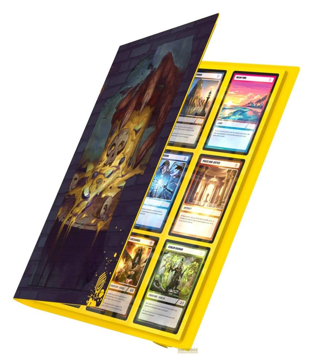 Carte da gioco in un portaoggetti giallo con arte scura a sinistra.