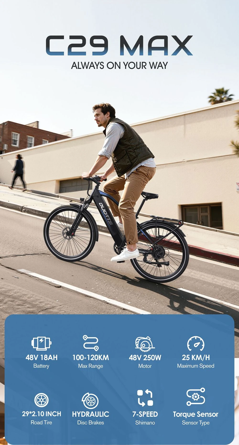 Un uomo guida una bici elettrica nera in salita. Le specifiche sono visibili.