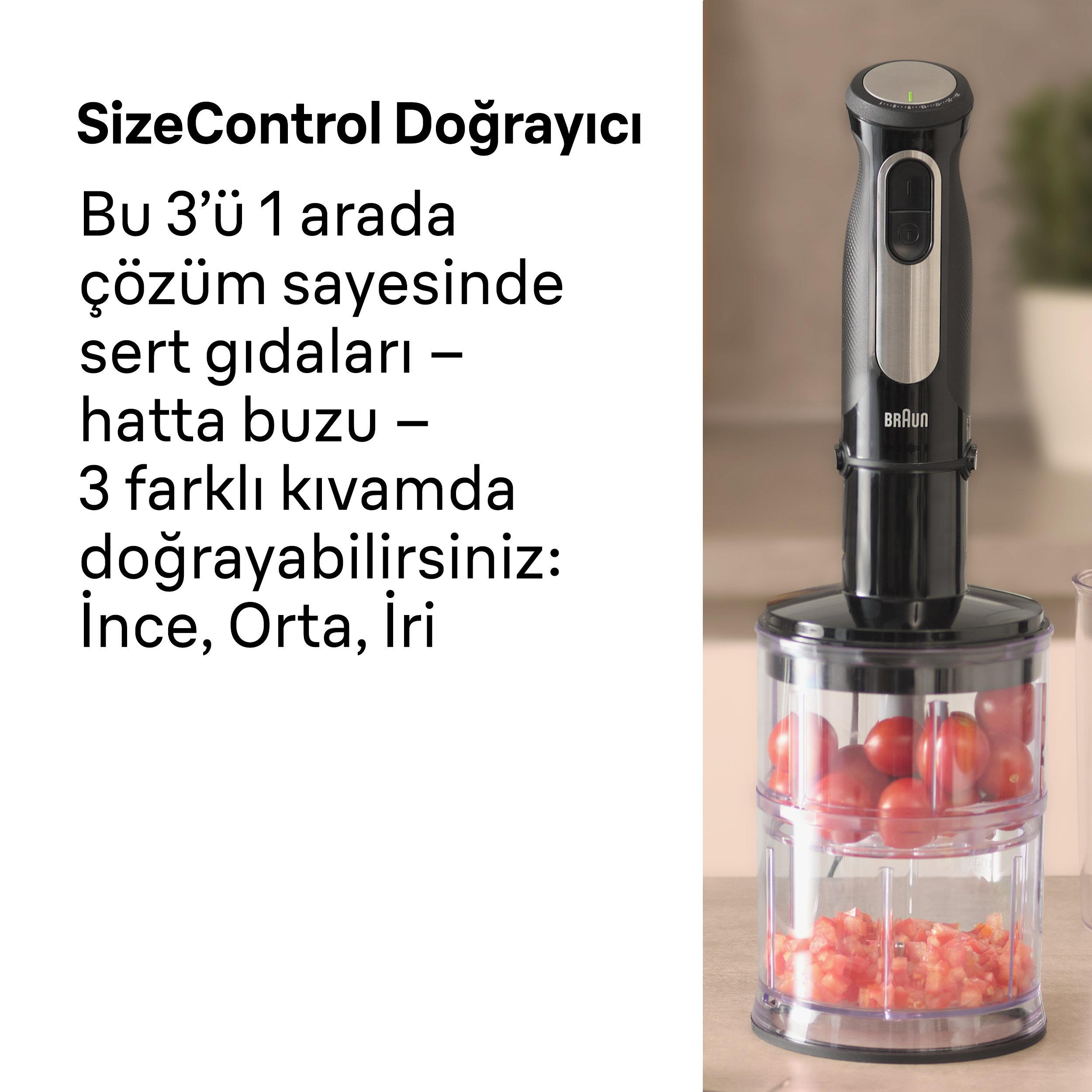 Siyah bir Braun el blenderi domates dolu bir kapta duruyor.