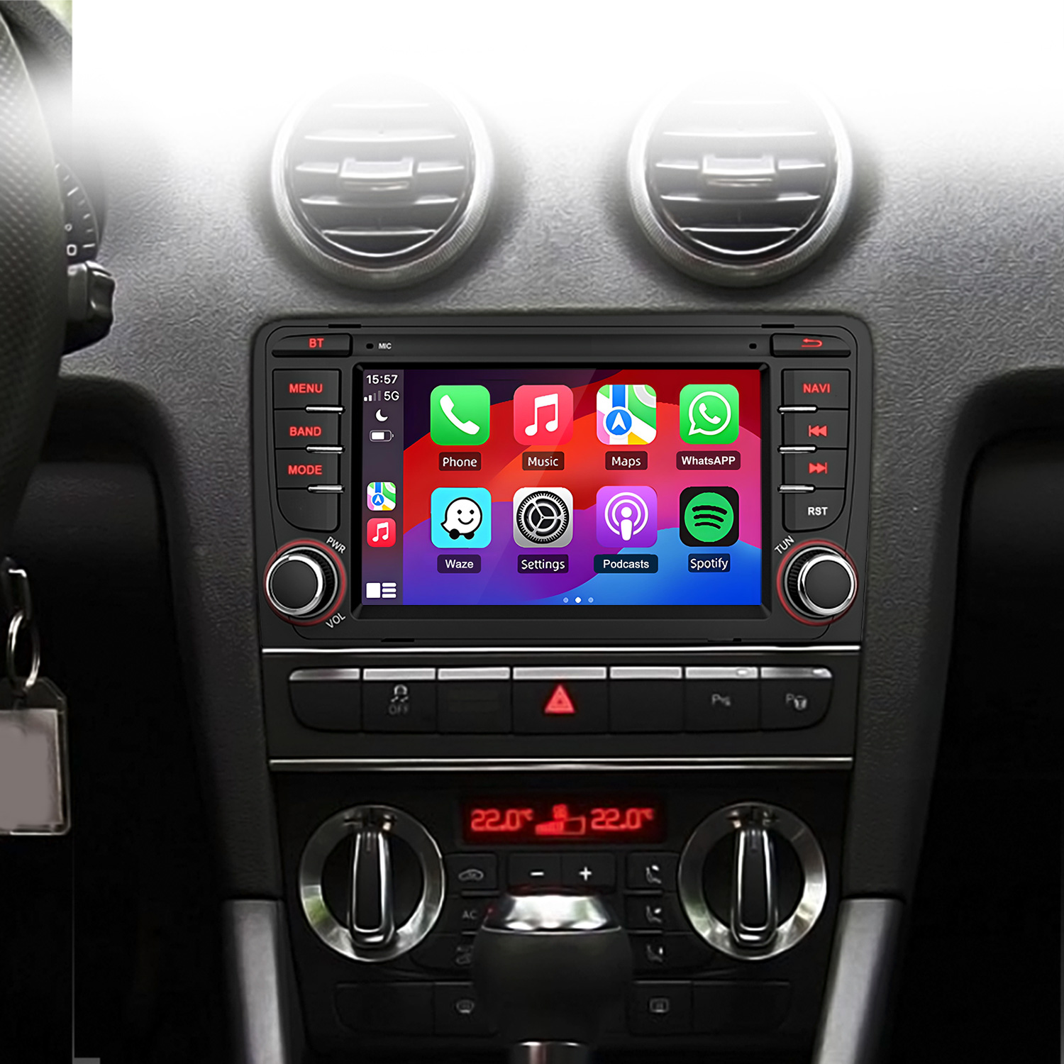 System infotainment samochodu wyświetlający aplikacje telefonu: Muzyka, Mapy, Spotify.