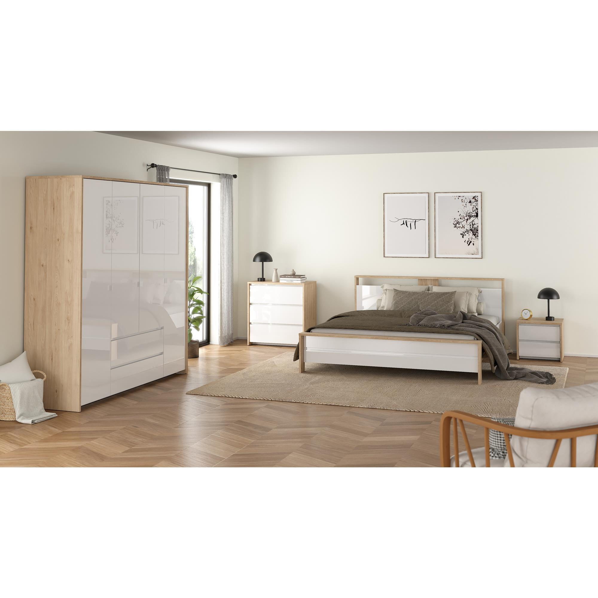 Dormitorio moderno con cama blanca, armario de madera, mesitas y arte.