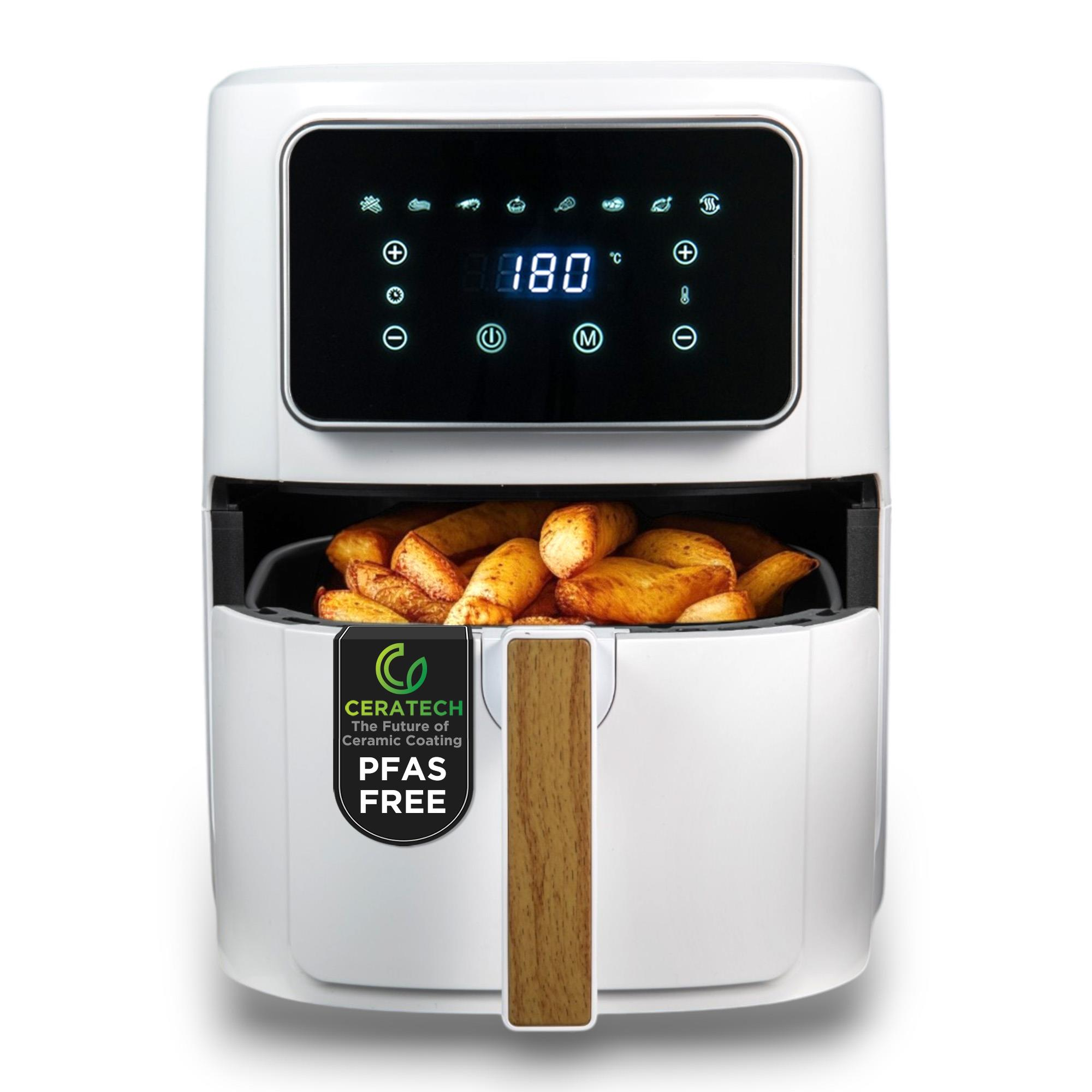Freidora de aire blanca con papas fritas. Pantalla digital muestra 180°C.