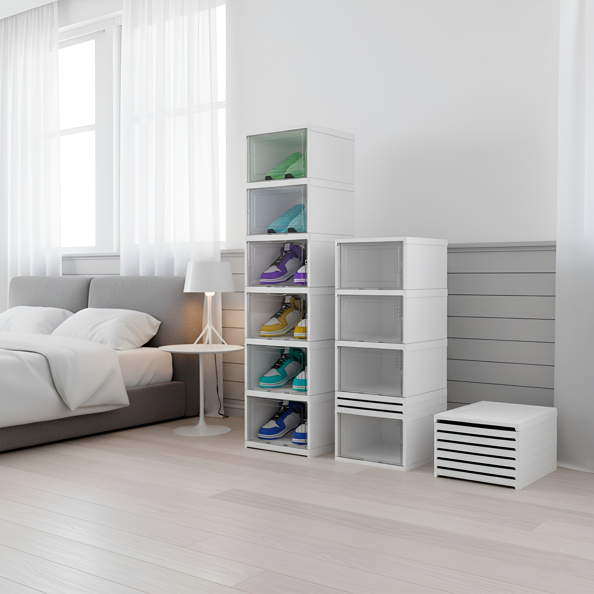 Un dormitorio con cama, mesita de noche y cajas de zapatos apiladas.