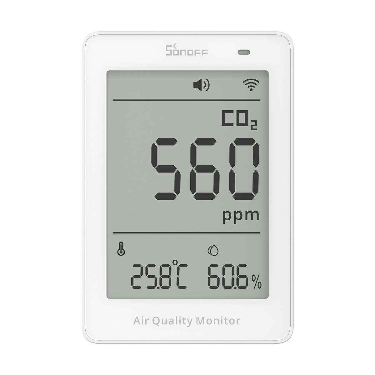 Un monitor de calidad del aire blanco muestra 560 ppm de CO2, 25,8 °C y 60,6 % de humedad.