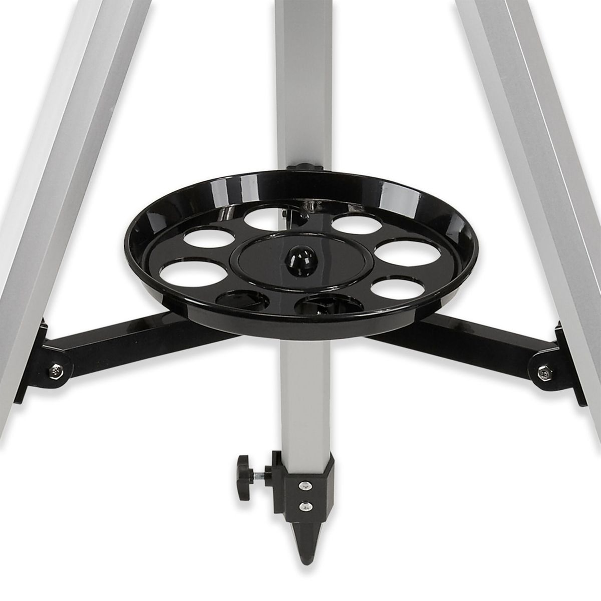 Un vassoio nero per accessori con aperture circolari attaccato a un treppiede.