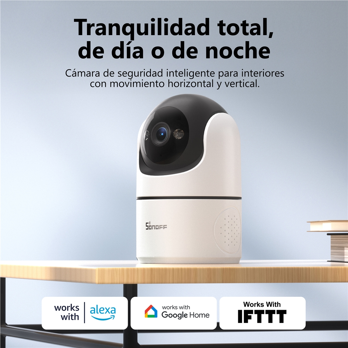 Weiße Sicherheitskamera mit schwarzem Kopf auf einem Tisch. Funktioniert mit Alexa, Google Home, IFTTT.