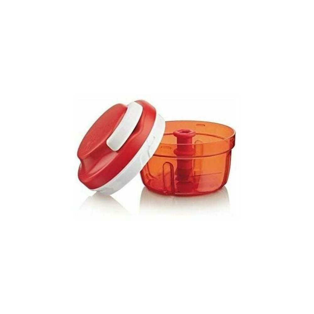 Ein roter und weißer Gemüseschneider mit transparentem orangefarbenem Behälter.