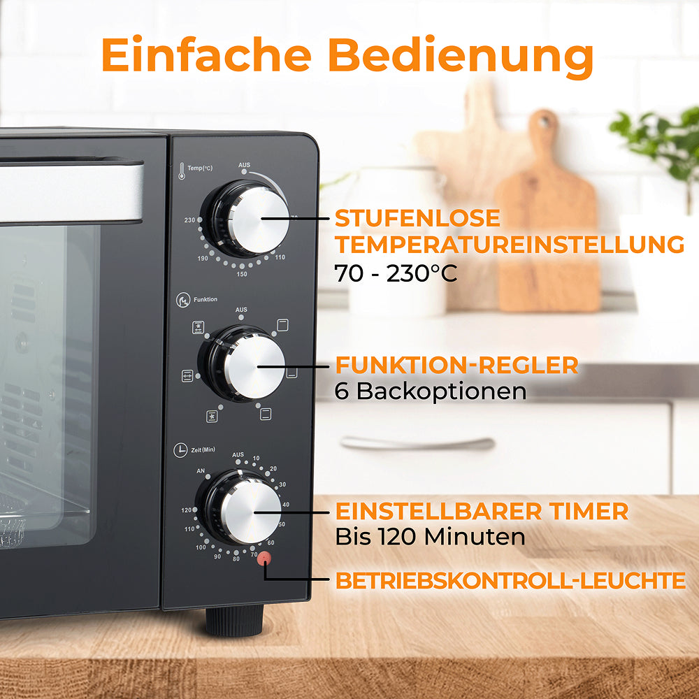 Ein schwarzer Minibackofen mit drei Drehreglern zur Temperatureinstellung, Funktion und Zeit.