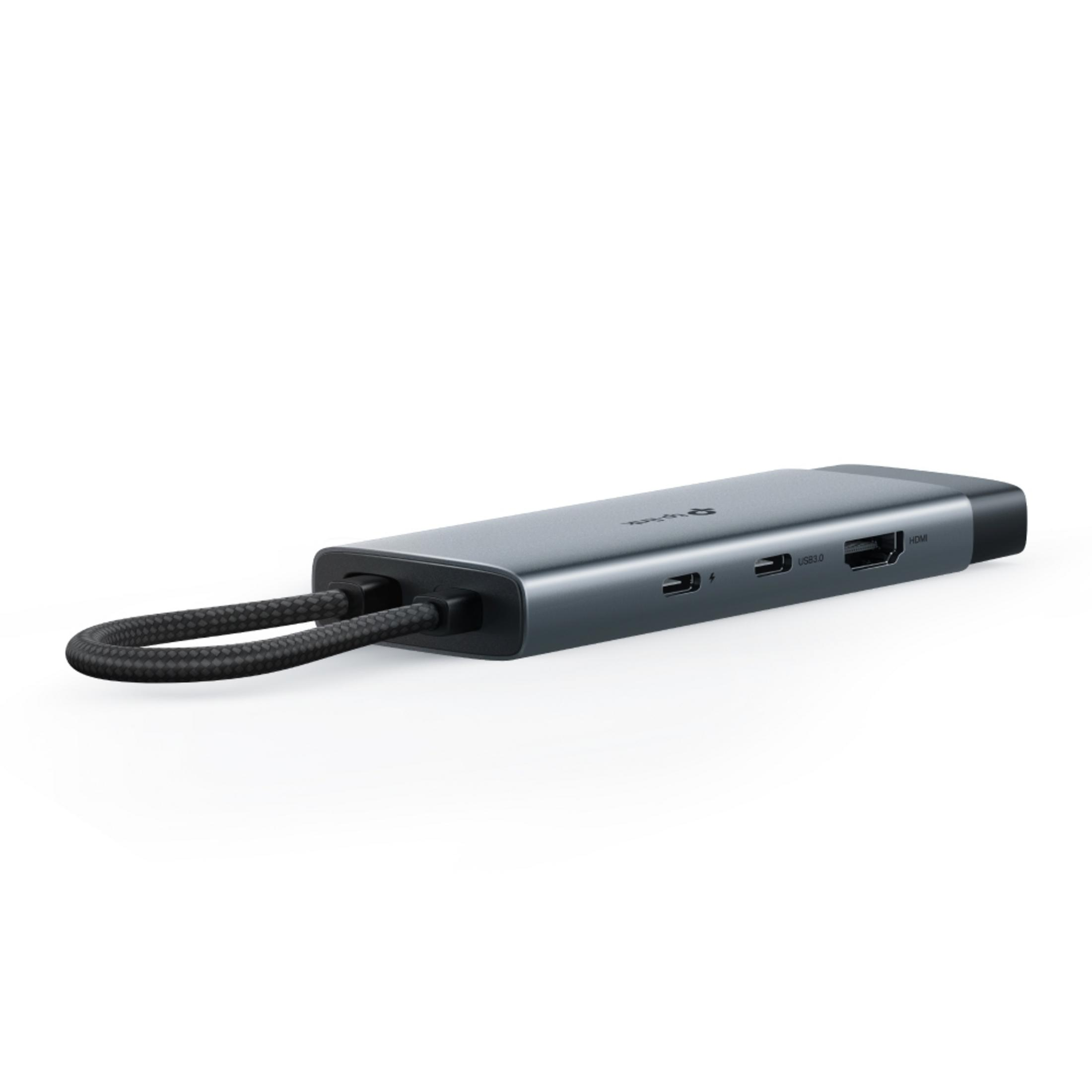 Szary hub USB-C z kablami i portami, w tym HDMI i USB 3.0.
