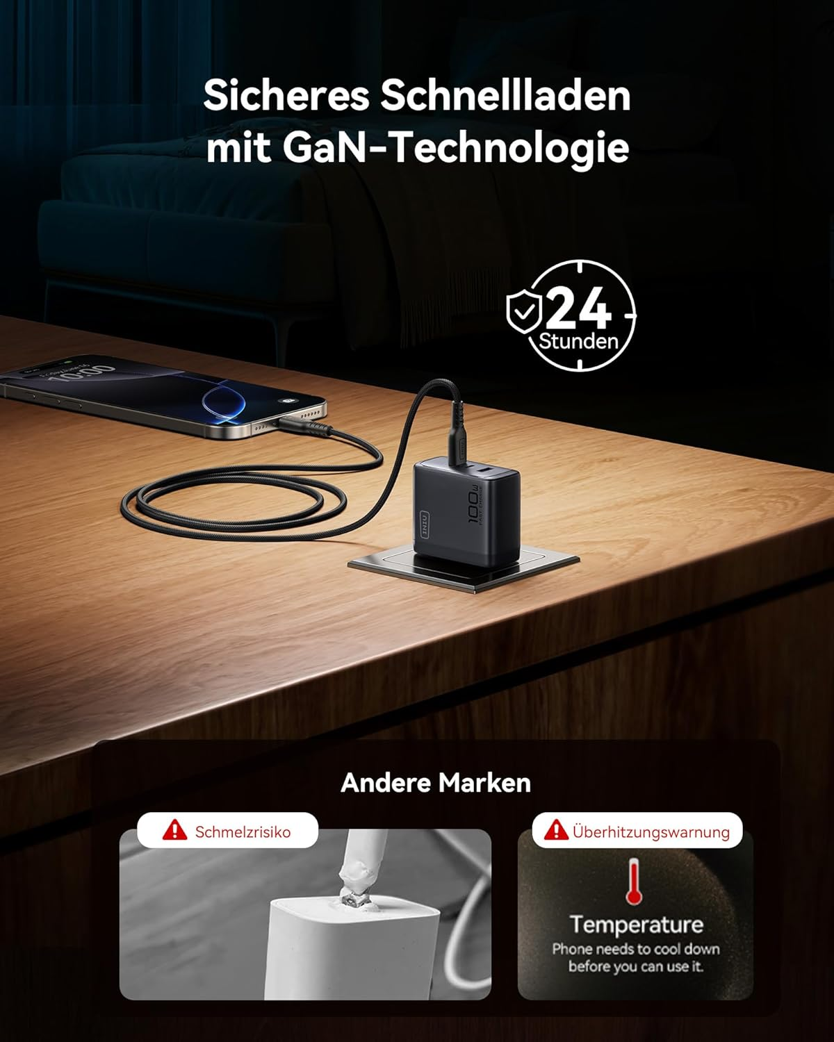 Czarna ładowarka ładuje smartfona na drewnianym stole. Widoczne ostrzeżenia.