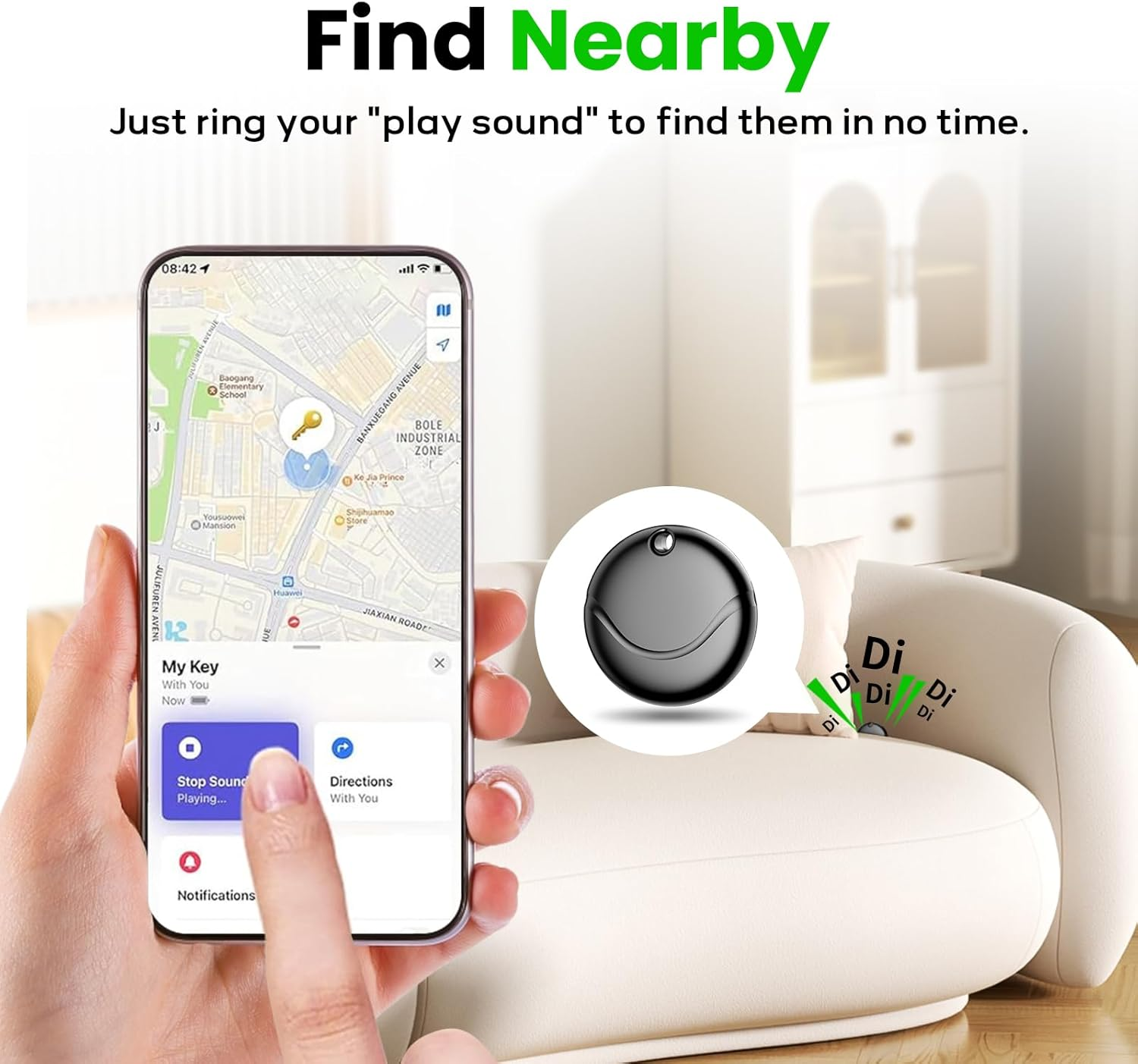 Ręka trzyma telefon z mapą. W pobliżu znajduje się lokalizator kluczy.